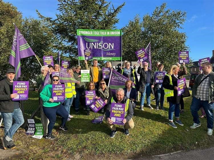 Union members on the picket lines last September