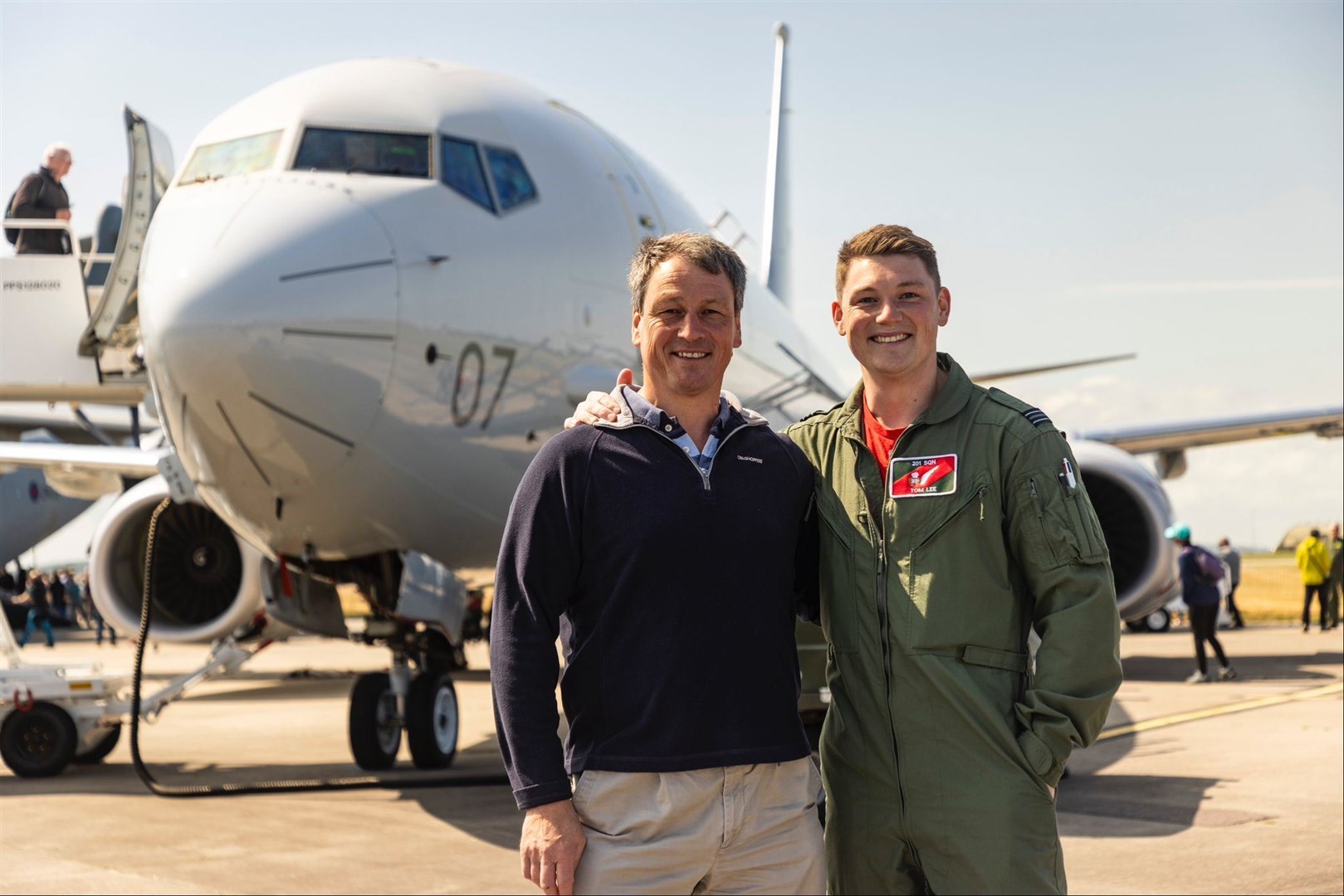 Nigel and Tom Lee at the RAF Lossiemouth Families Day in July 2023 in front of P-8 Poseidon.