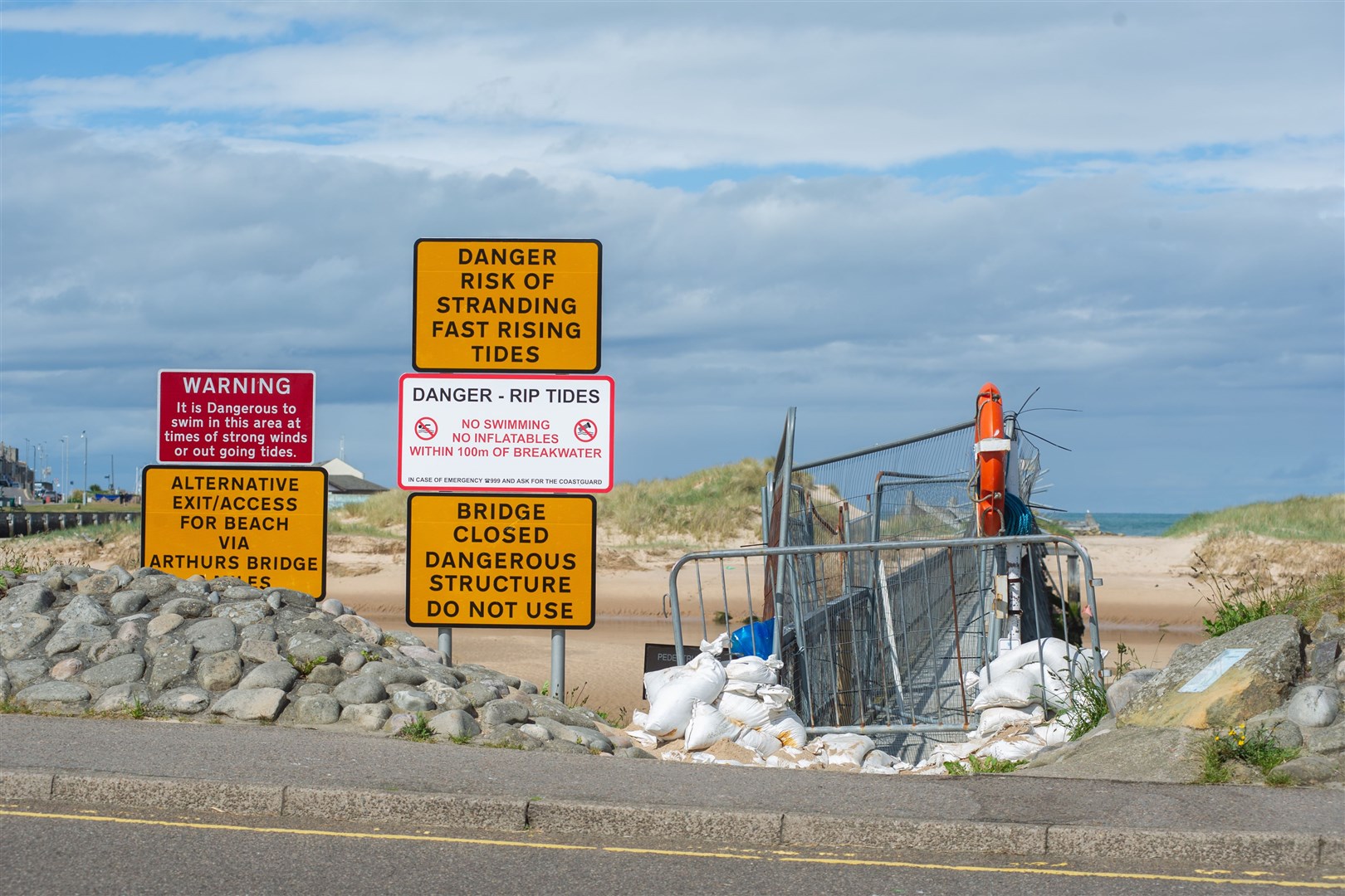 Moray Council installed fencing on Lossiemouth's East Beach footbridge to prevent attempts to cross the dangerous structure. Picture: Daniel Forsyth