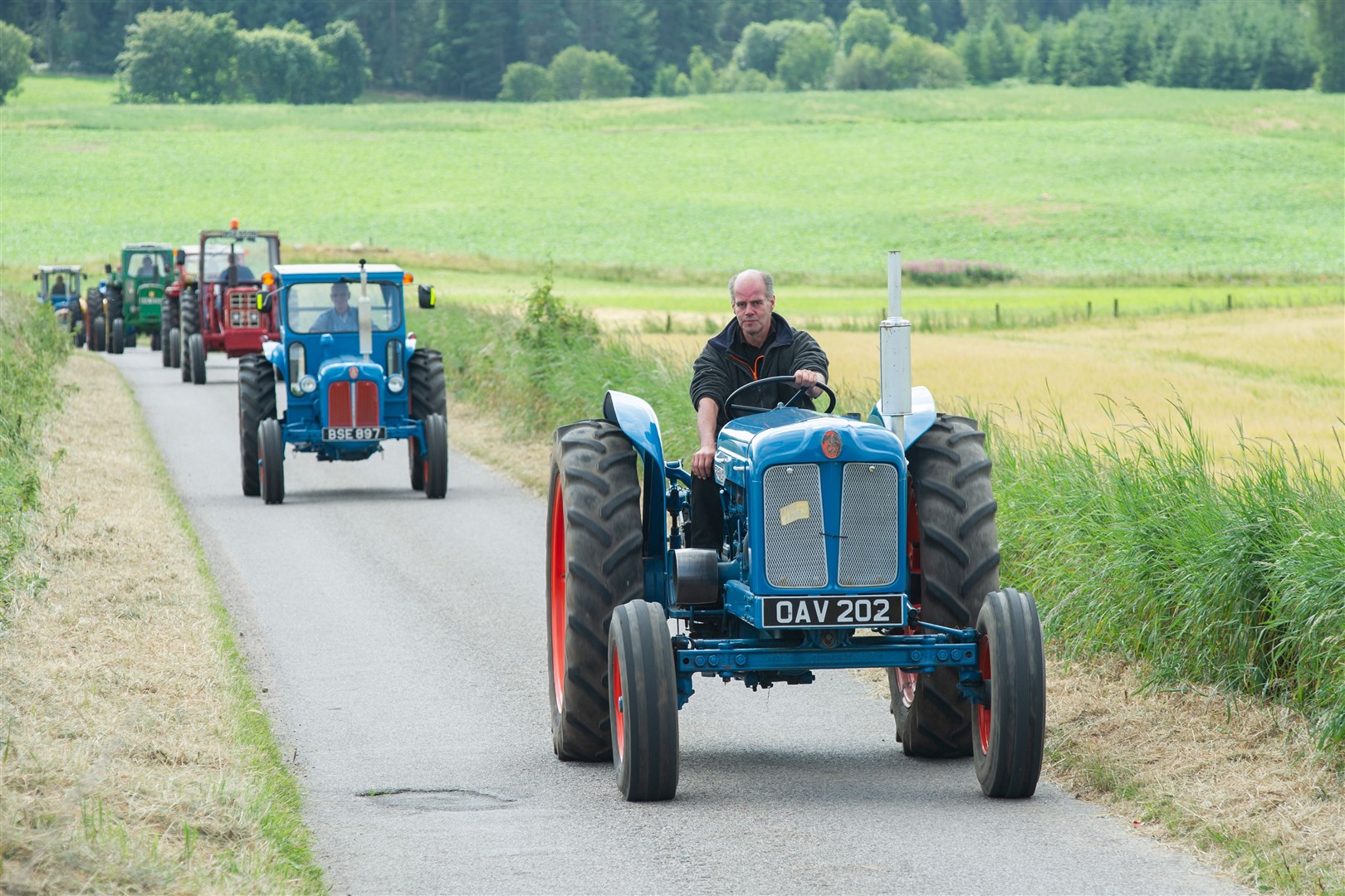 The tractor run make their way from Hillside Farm in Mosstowie as they head towards the coast for the afternoon loop...The Spey Valley Vintage Engine and Tractor Club enjoy a Sunday run with their tractors...Picture: Daniel Forsyth..