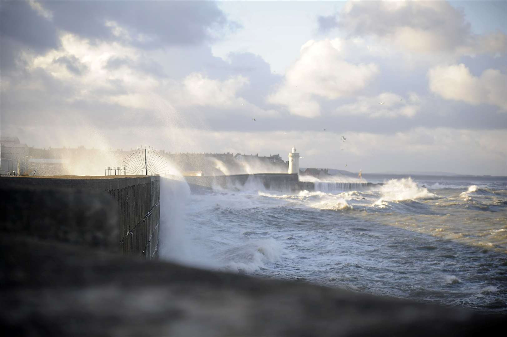 Large waves crash against the harbour wall in Buckie...Picture: Becky Saunderson..