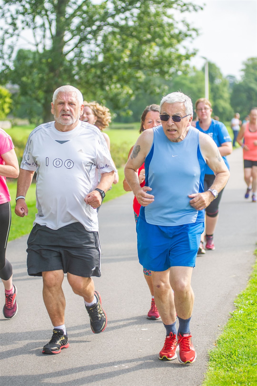 Bill Cooke and Wenzell Dunnett celebrate running their 100th park run. Picture: Daniel Forsyth. Image No.044530.