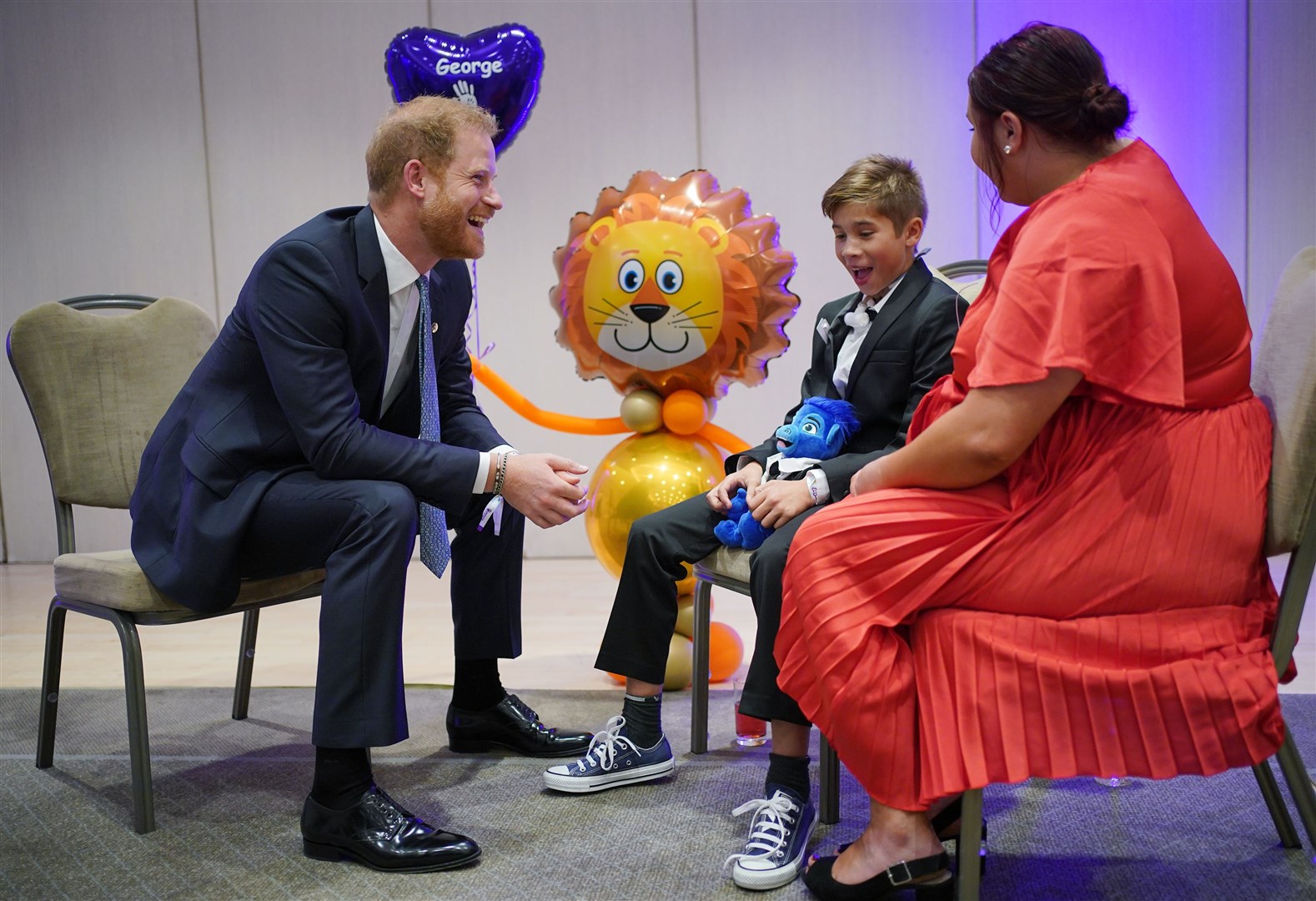 The Duke of Sussex met 11-year-old George Hall, from Skipton, North Yorkshire, who was receiving an Inspirational Young Person award (Yui Mok/PA)