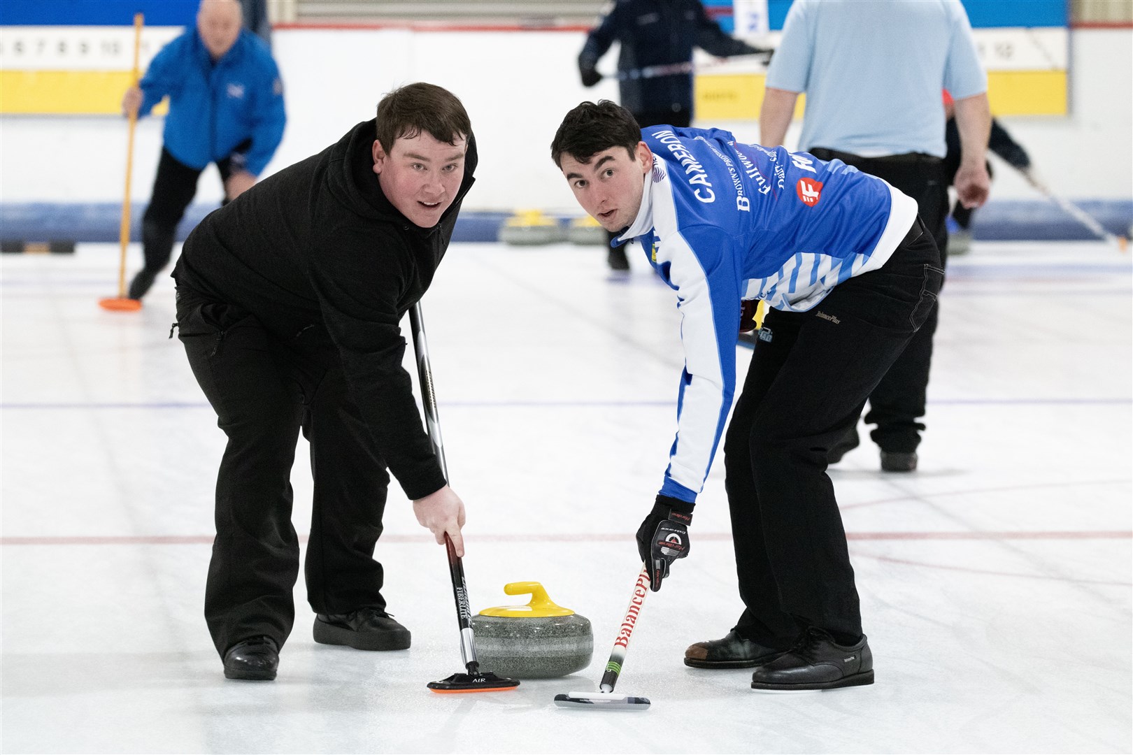 Matthew Smith (left) and Gavin Cameron (right) judging when's best to start sweeping. Picture: Beth Taylor.