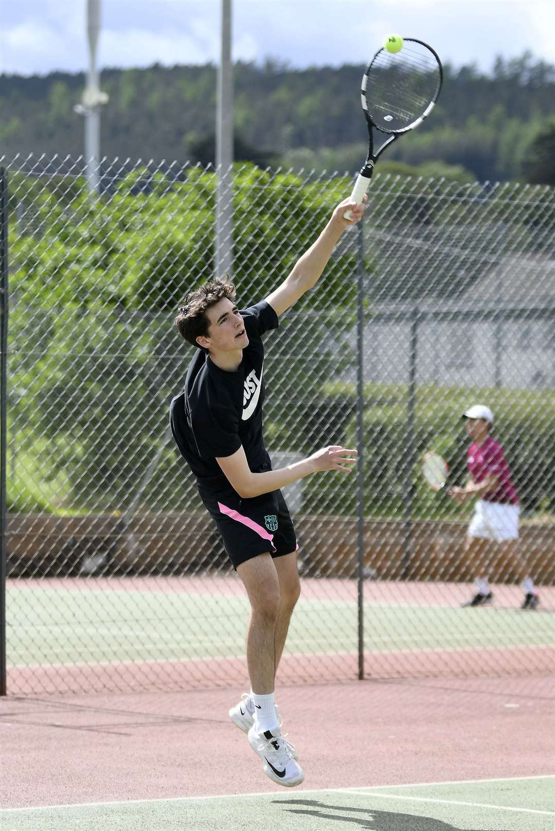 Liam Anderson serves up a shot. Picture: Becky Saunderson..