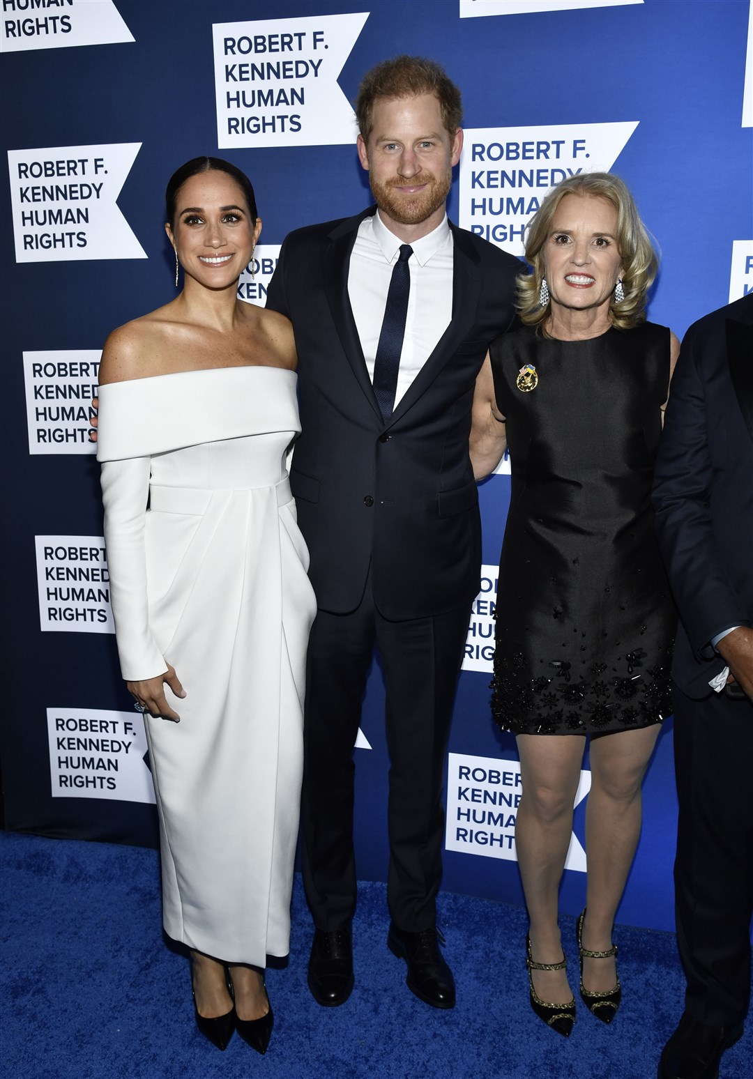 Meghan, Duchess of Sussex, from left, Prince Harry and Kerry Kennedy attend the Robert F Kennedy Human Rights Ripple of Hope Awards Gala (Evan Agostini/AP)
