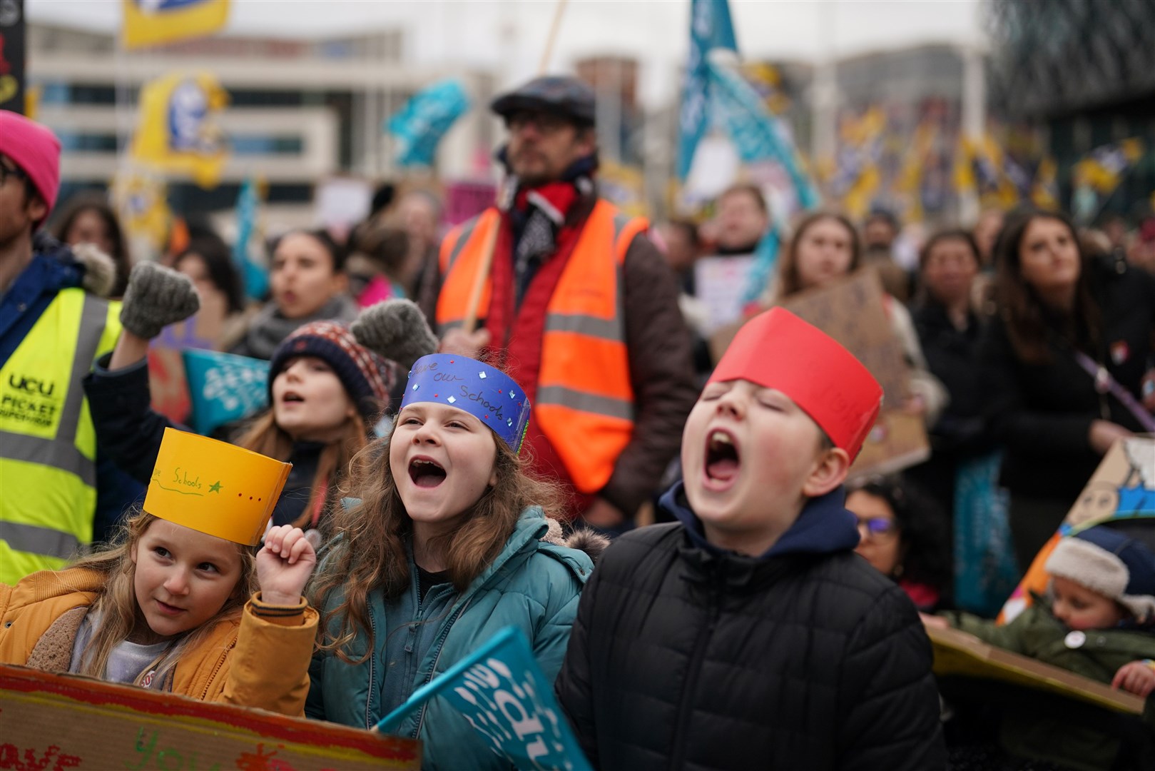 Schoolchildren join the National Strike Action Rally in Birmingham city centre (Jacob King/PA)