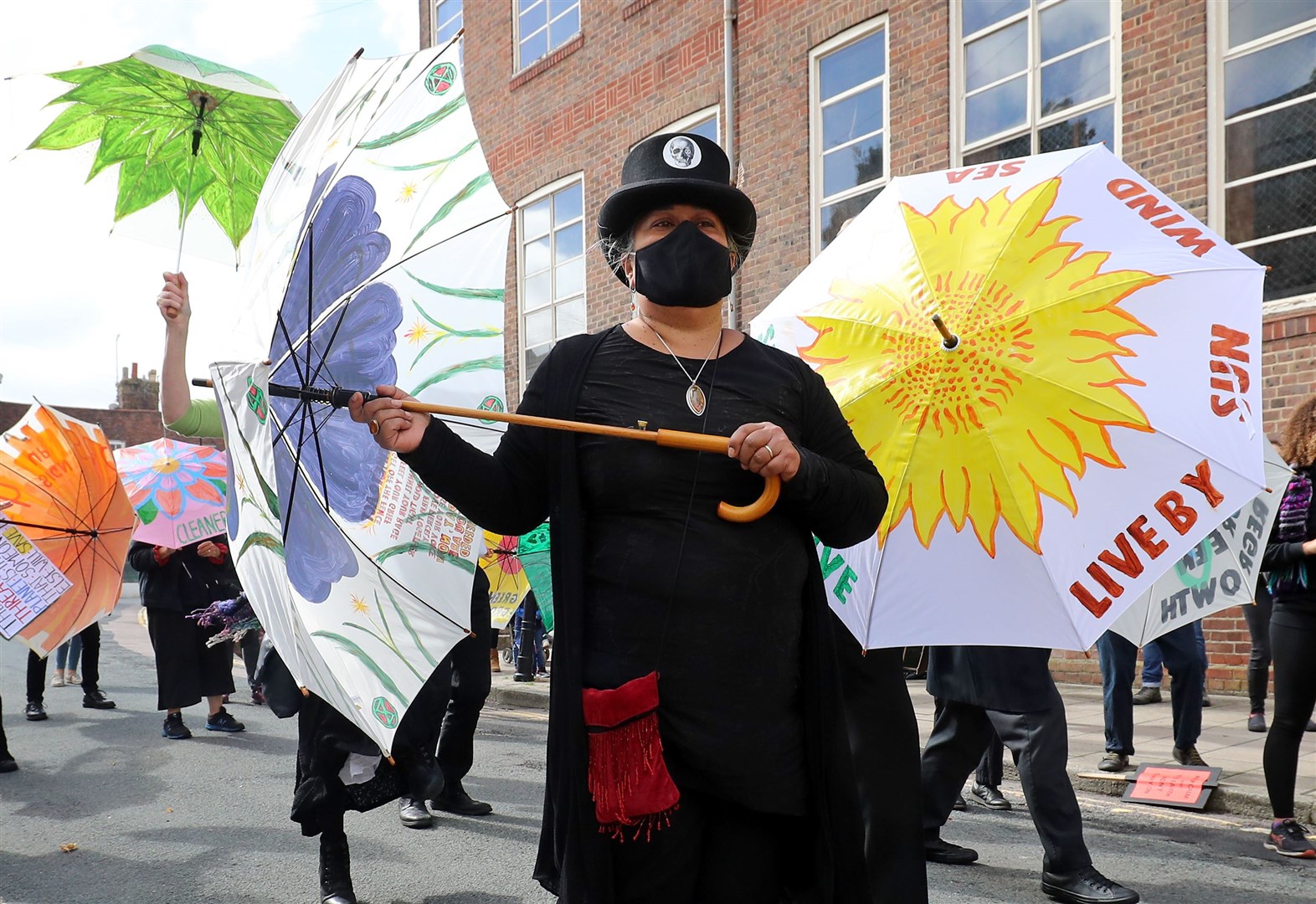 In Lewes, East Sussex, protesters carried umbrellas to mimic New Orleans’ funeral processions (Gareth Fuller/PA)