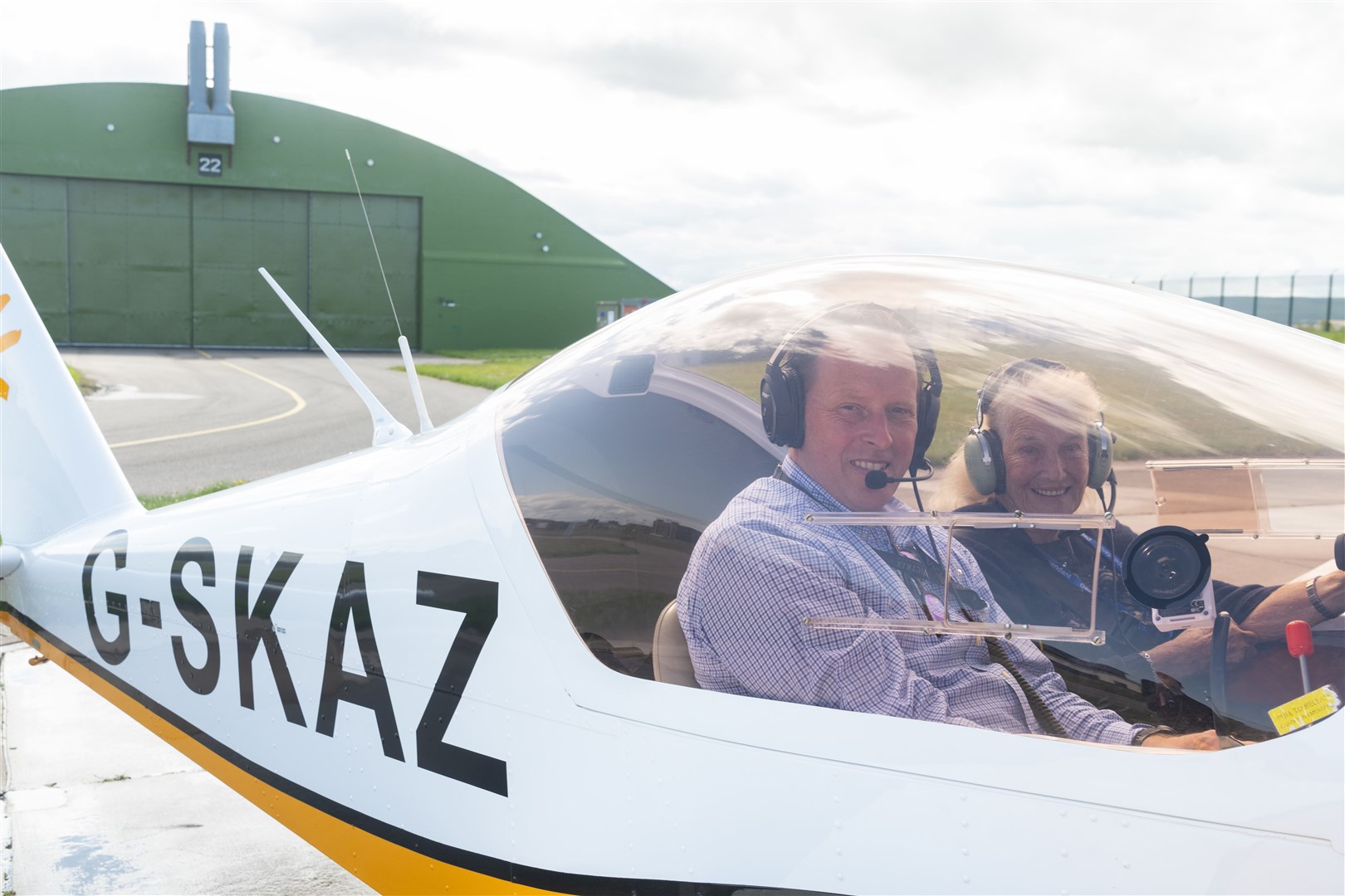 Stuart Anselm (Instructor at Moray Flying Club) and Rosie Hales-Tooke who flew up in the Aero AT-3 R100 Aeroplane for her 88th birthday...Picture: Beth Taylor.