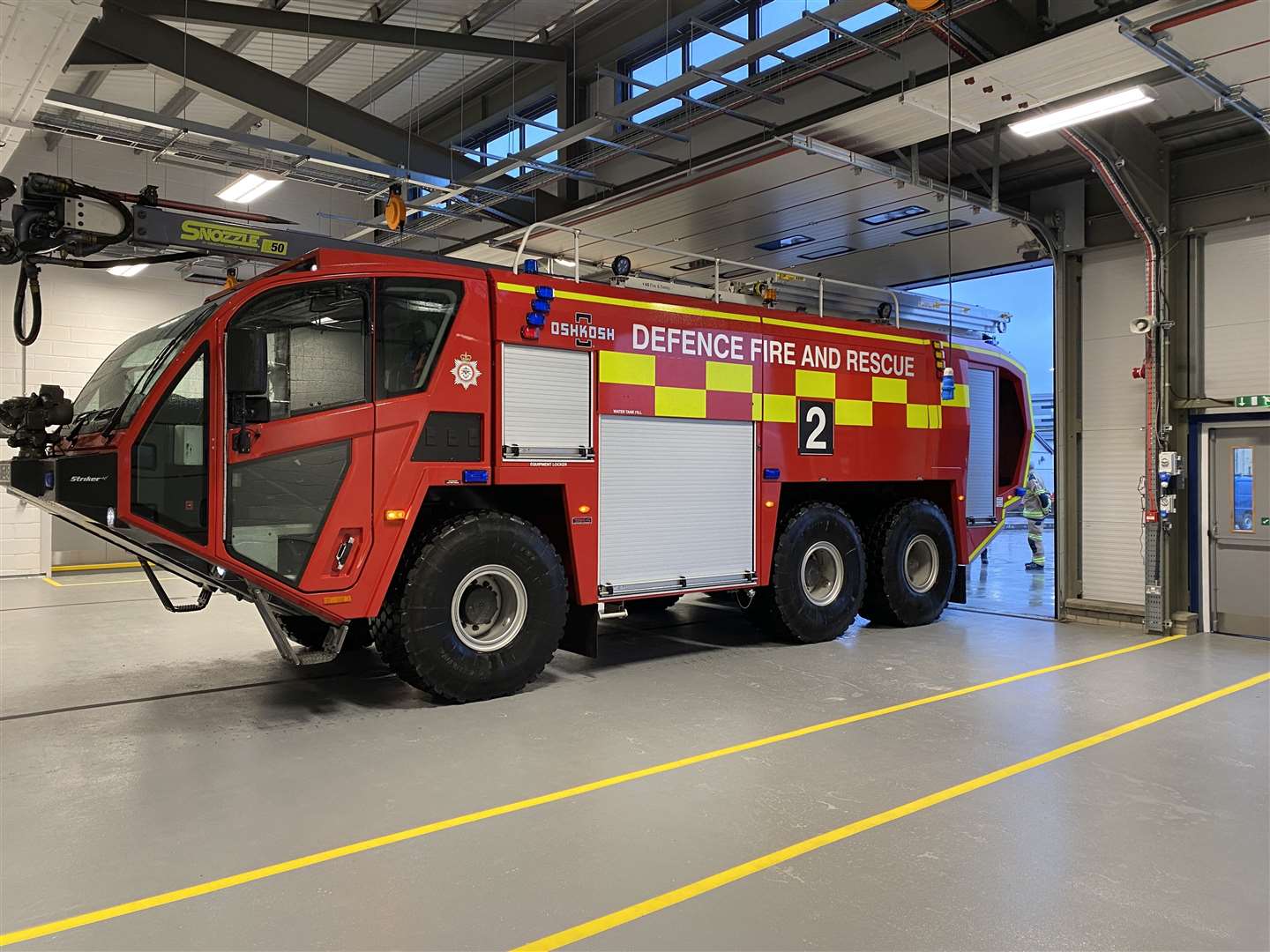 A new fire engine in the Crash, Fire and Rescue building at RAF Lossiemouth. (Copyright Henry Brothers)