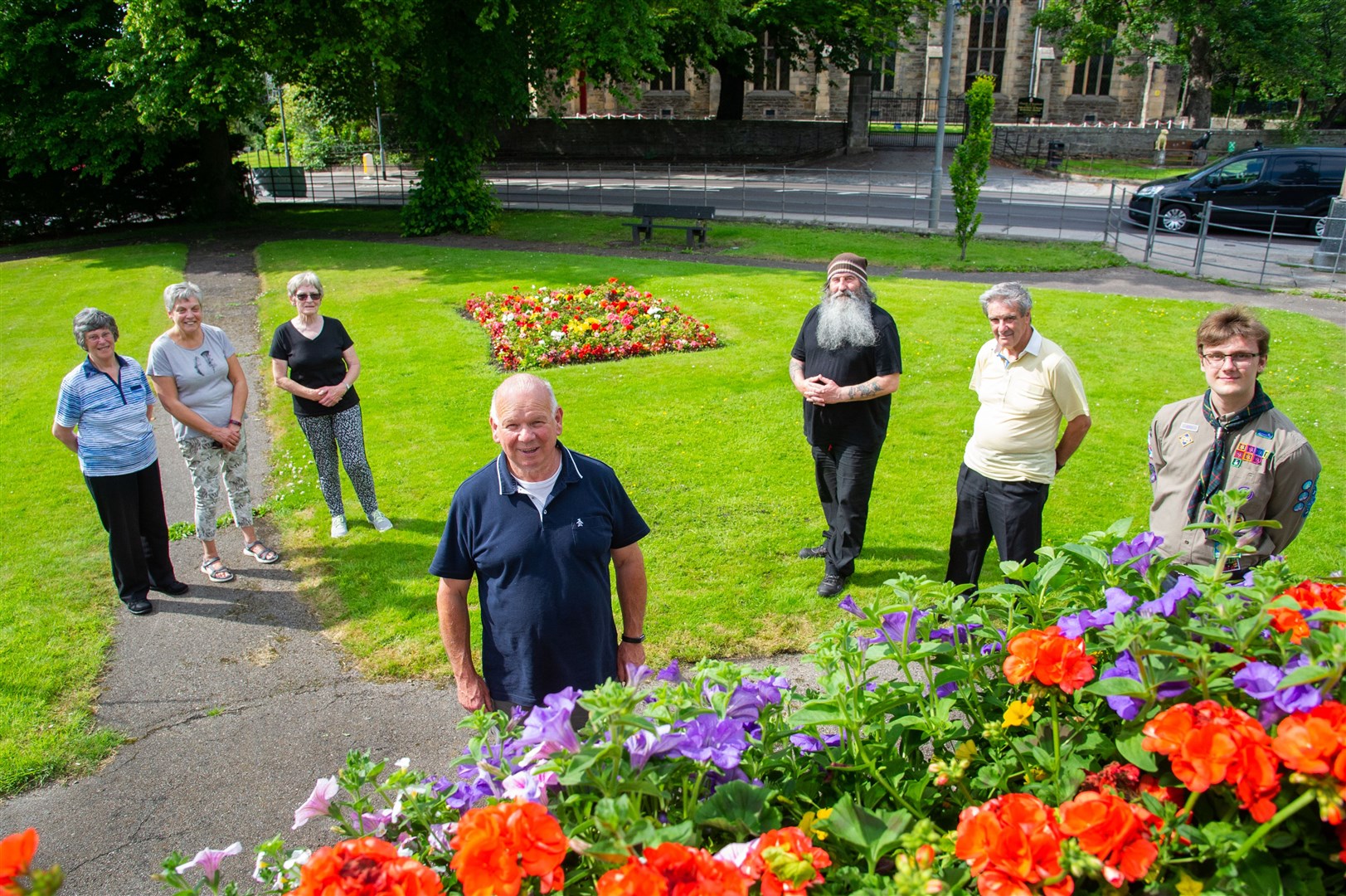 Davie pictured in 2014 along with other helpers at the Keith Bandstand where a large effort had been made to replant and brighten the area. Picture: Daniel Forsyth.