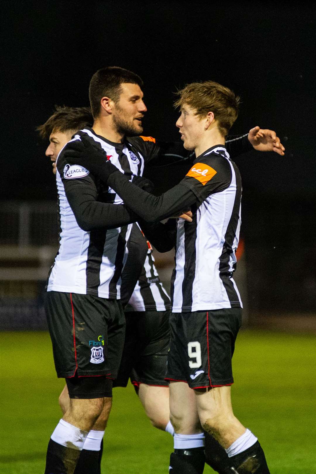 Matthew Cooper enjoys one of Elgin City's high points of the season with Kane Hester. Picture: Daniel Forsyth..