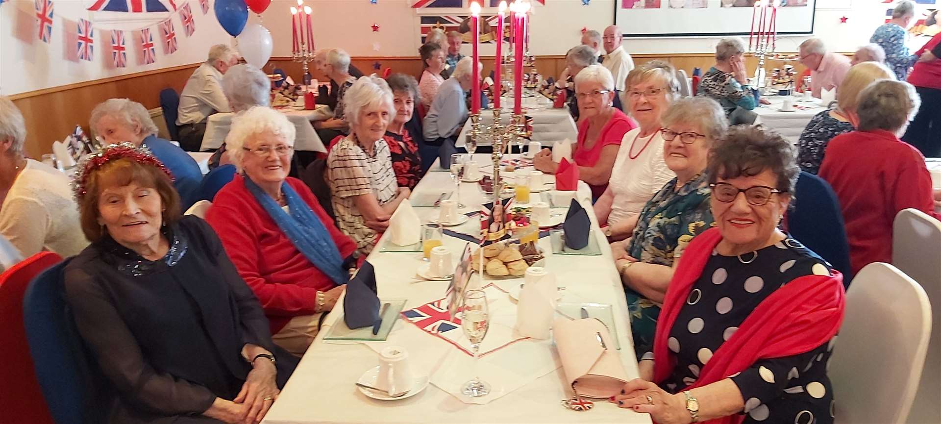 Eleanor Simpson (93), second from left at this table, says the Queen has done her job very well.