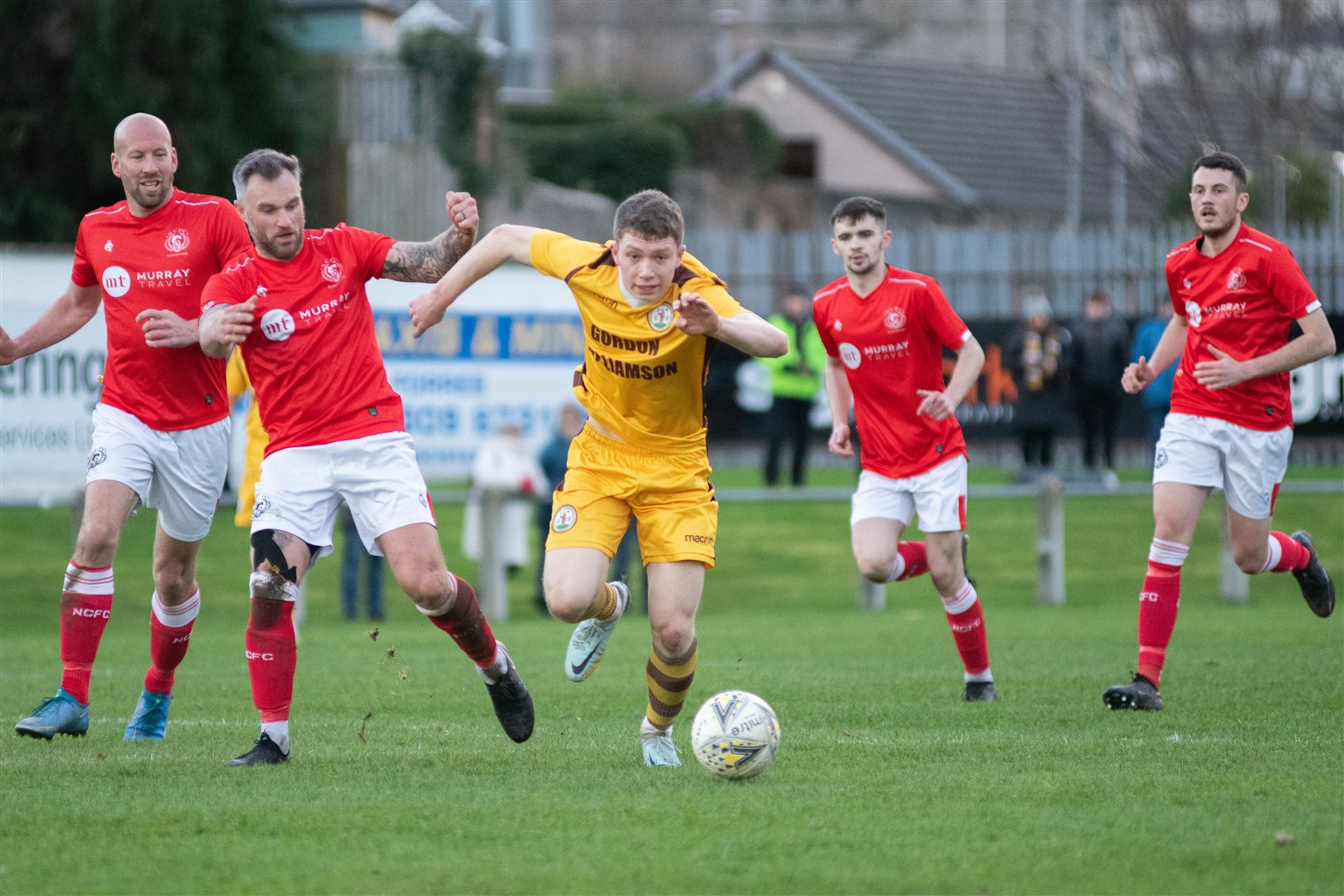 Forres Mechanics' Craig Mackenzie charges forward...Forres Mechanics FC (3) vs Nairn County FC (4) - Highland Football League 22/23 - Mosset Park, Forres 26/11/2022...Picture: Daniel Forsyth..