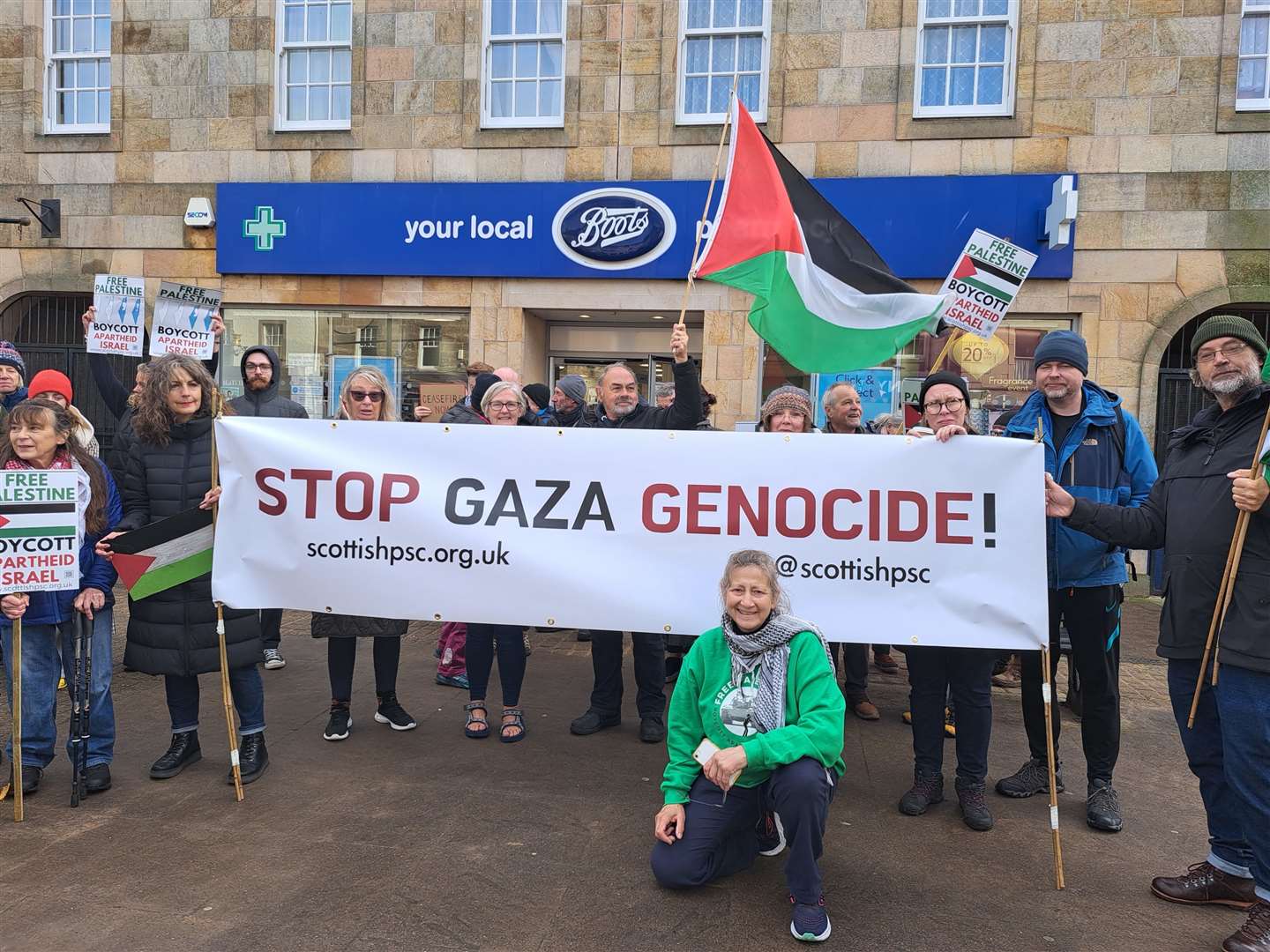 Nahed Gadalla is at the front of demonstrators on Forres High Street, calling for a ceasefire in Gaza.