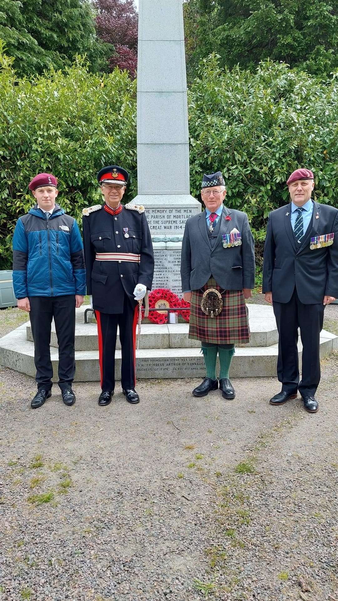 (From left) Jack Granitza, Lord Lieutenant of Banffshire Andrew Simpson, Lieutenant General Sir Alistair Irwin and Alastair Combe by the fresh wreaths.