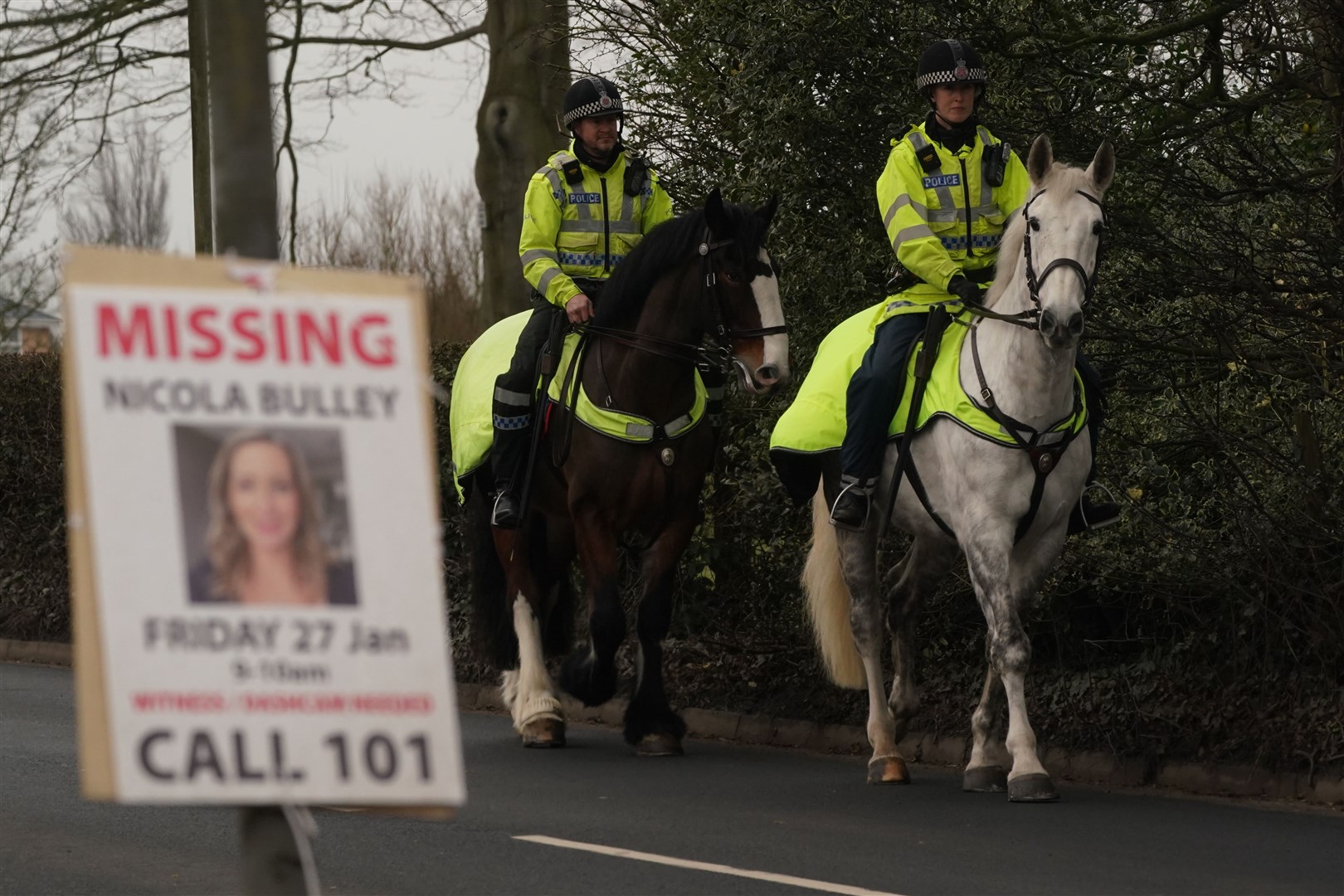 Mounted police officers in the village of St Michael’s on Wyre (Owen Humphreys/PA)