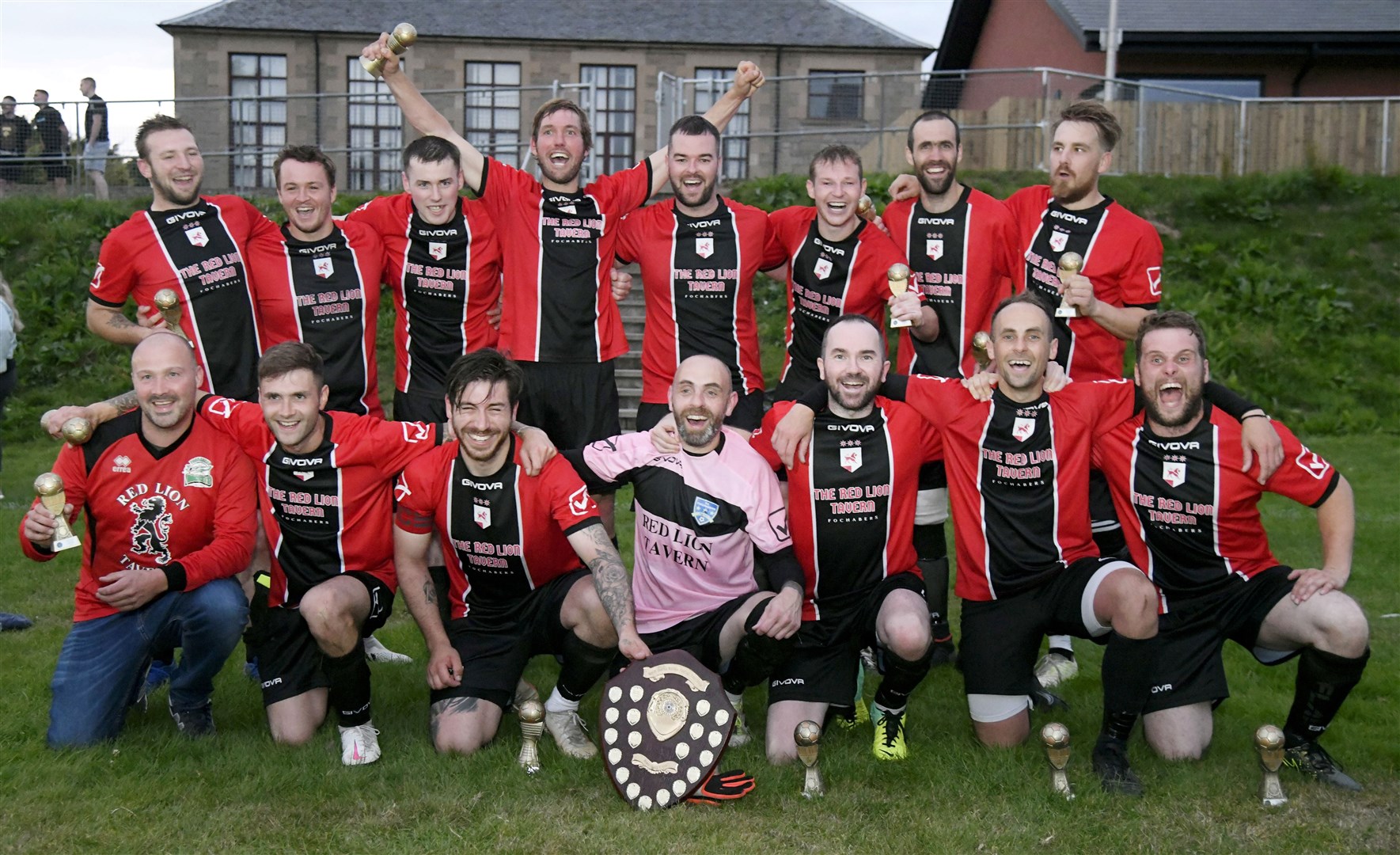 We are the champions! The Fochabers team in jubilant mood. Picture: Beth Taylor