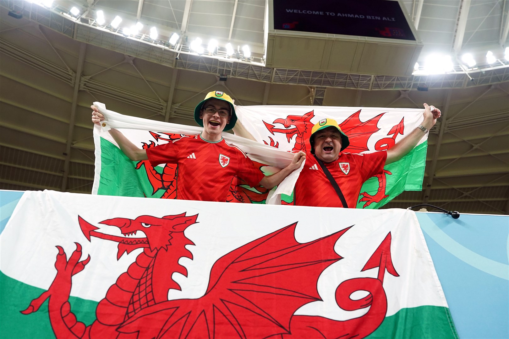 Wales fans in the stands at the Ahmad Bin Ali Stadium in Qatar (Martin Rickett/PA)
