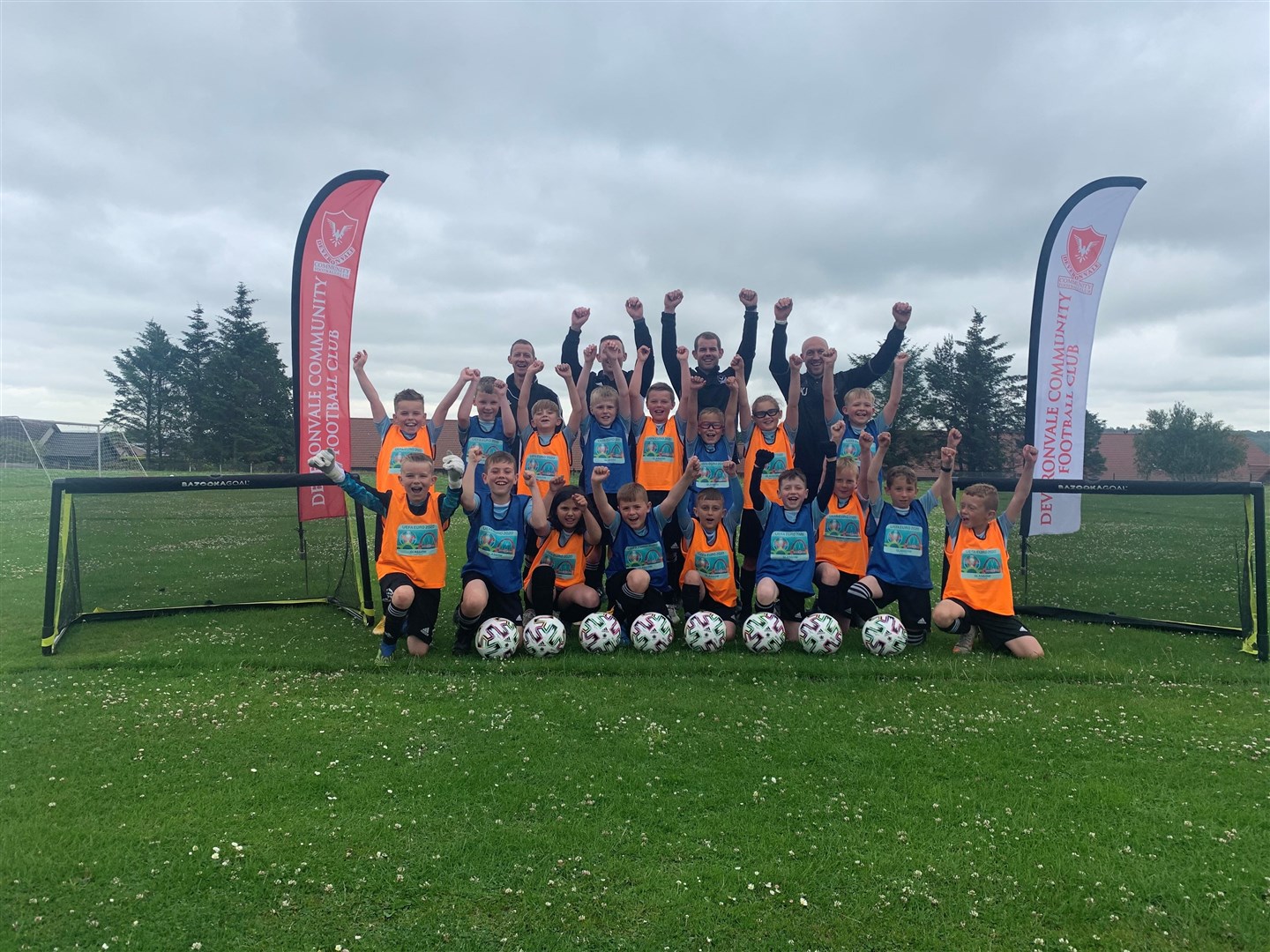 Deveronvale Community Football Club youngsters celebrate their EURO 2020 legacy award.