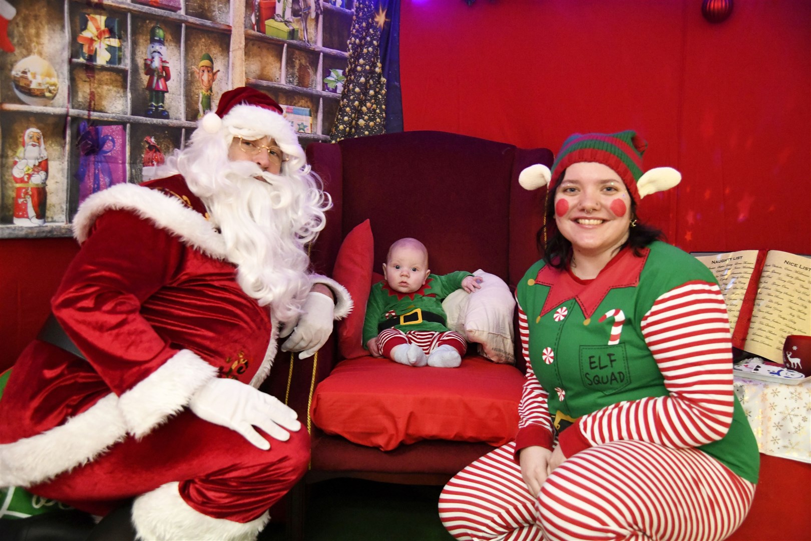 Santa with Archie Smart and Elf Jingles at his Grotto in the St Giles Centre in Elgin...Pictre: Beth Taylor.