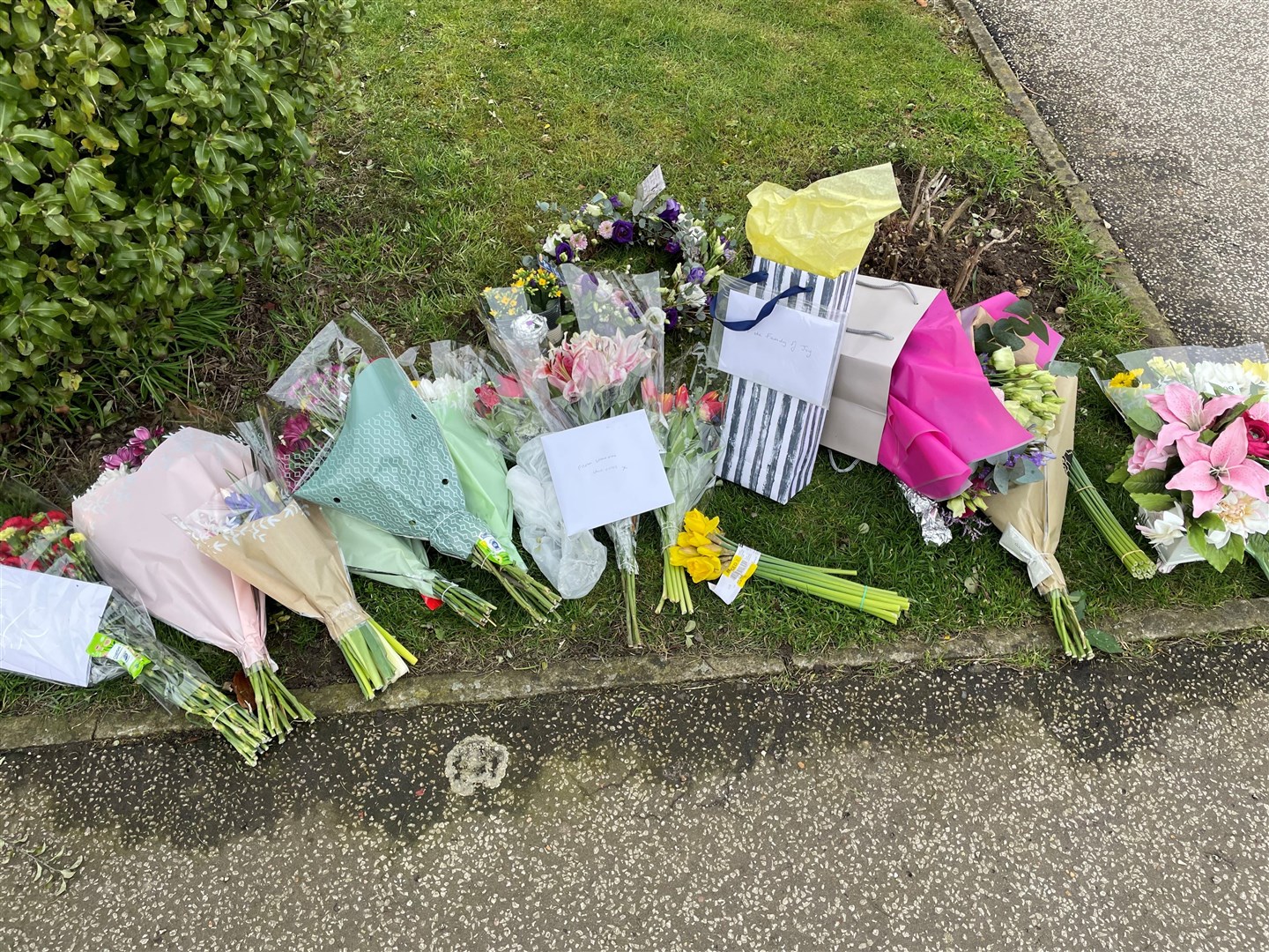 Floral tributes in Grayson Avenue, Pakefield, Suffolk, as police investigate the murder of pensioner Joy Middleditch (Sam Russell/PA)