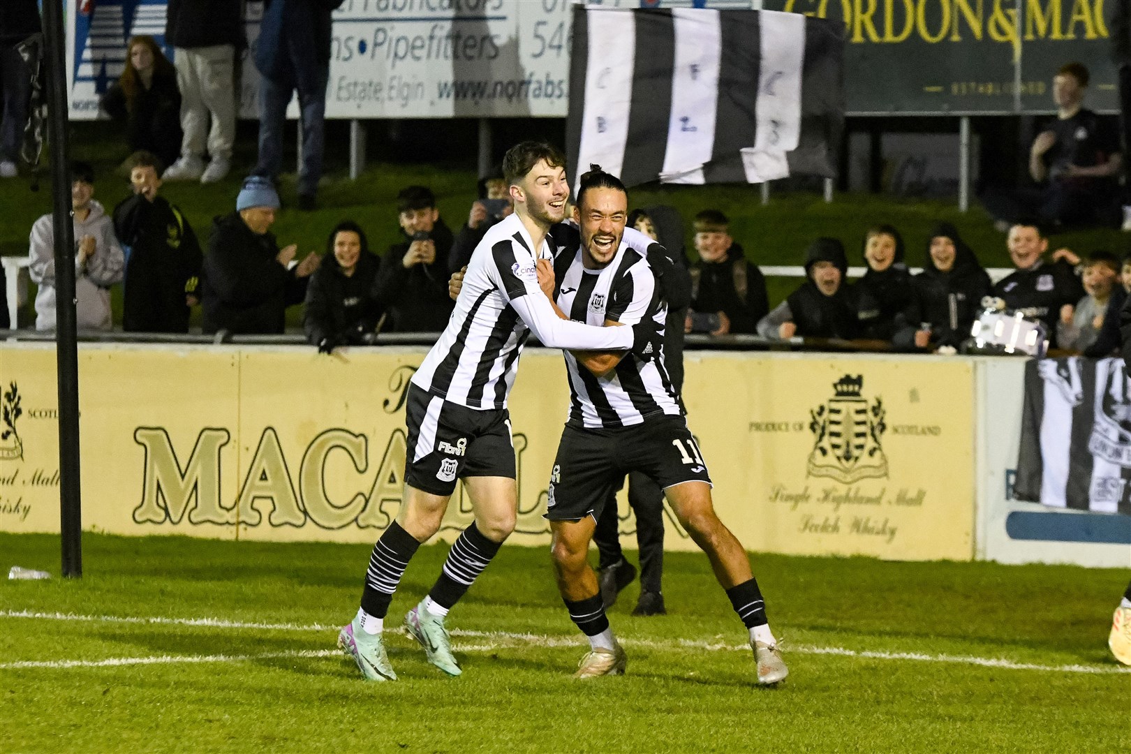 Liam Harvey celebrates his winning Elgin City penalty with Dayshonne Golding. Picture: Beth Taylor.