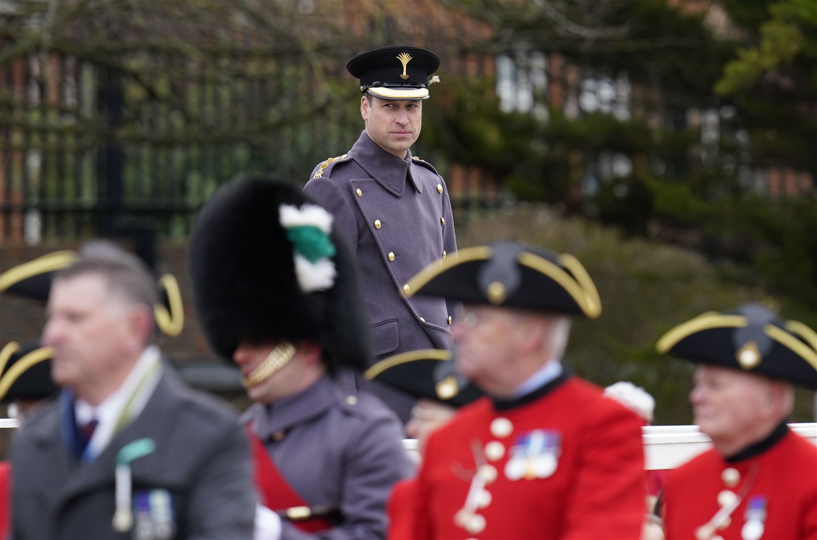 The Prince of Wales watches the march past during the St David’s Day parade (Andrew Matthews/PA)