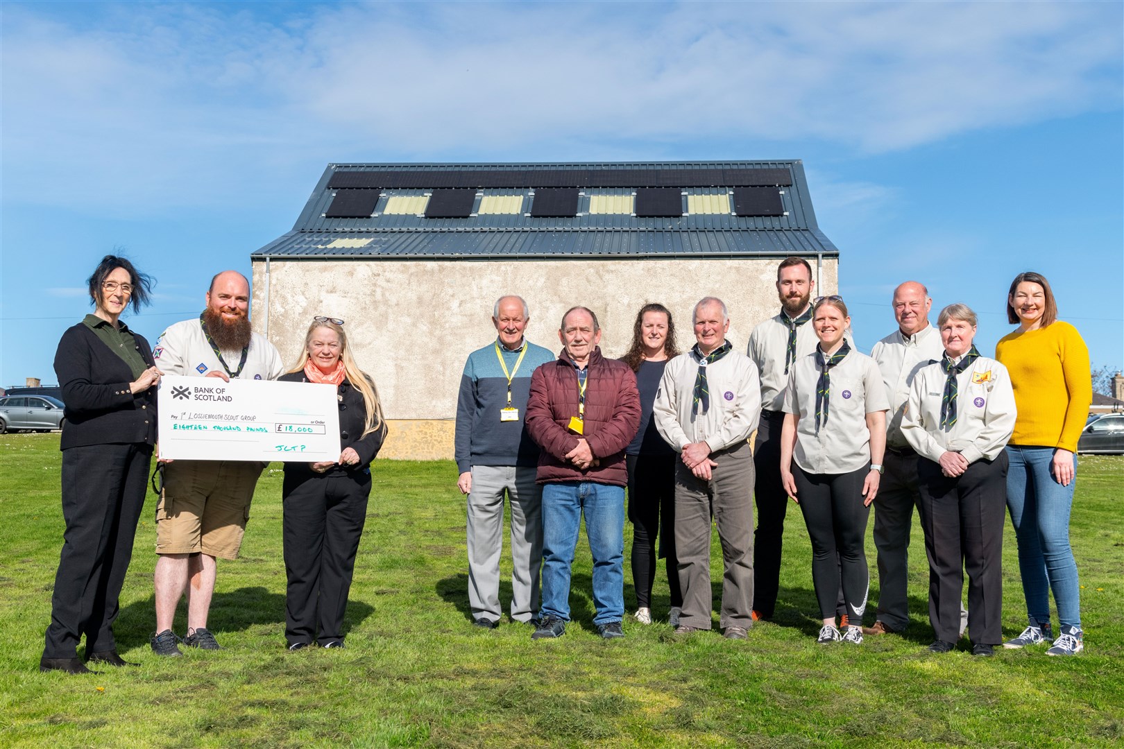 1st Lossiemouth Scout Group have fitted solar panels after receiving a grant of £18,000 from the Just Transition Participatory Budgeting Fund. From left: Ann Mitchell (Money for Moray), Alan Anderson (Scout Master) and Karen Pryce-Iddon (Money for Moray). Picture: Beth Taylor
