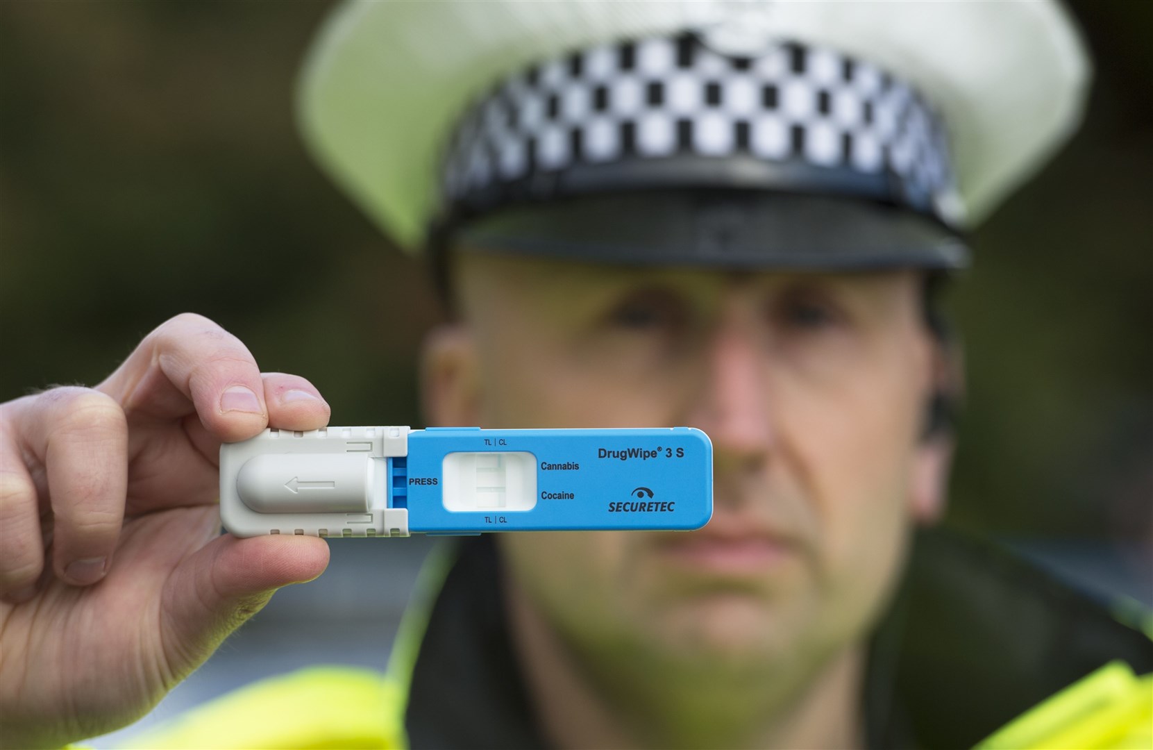 Constable Stewart Logan with one of the Drugswipe testing kits as new drug-driving laws are introduced. Picture: Neil Hanna Photography.
