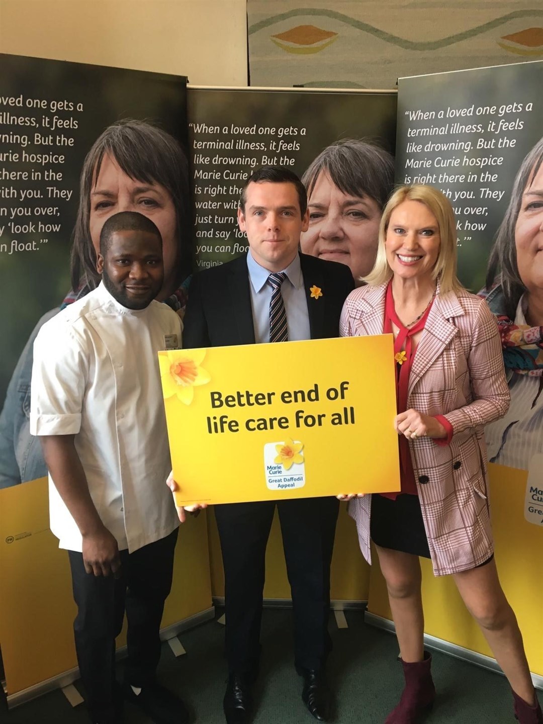 Douglas Ross MP with Lukmon Adeymi and Anneka Rice.