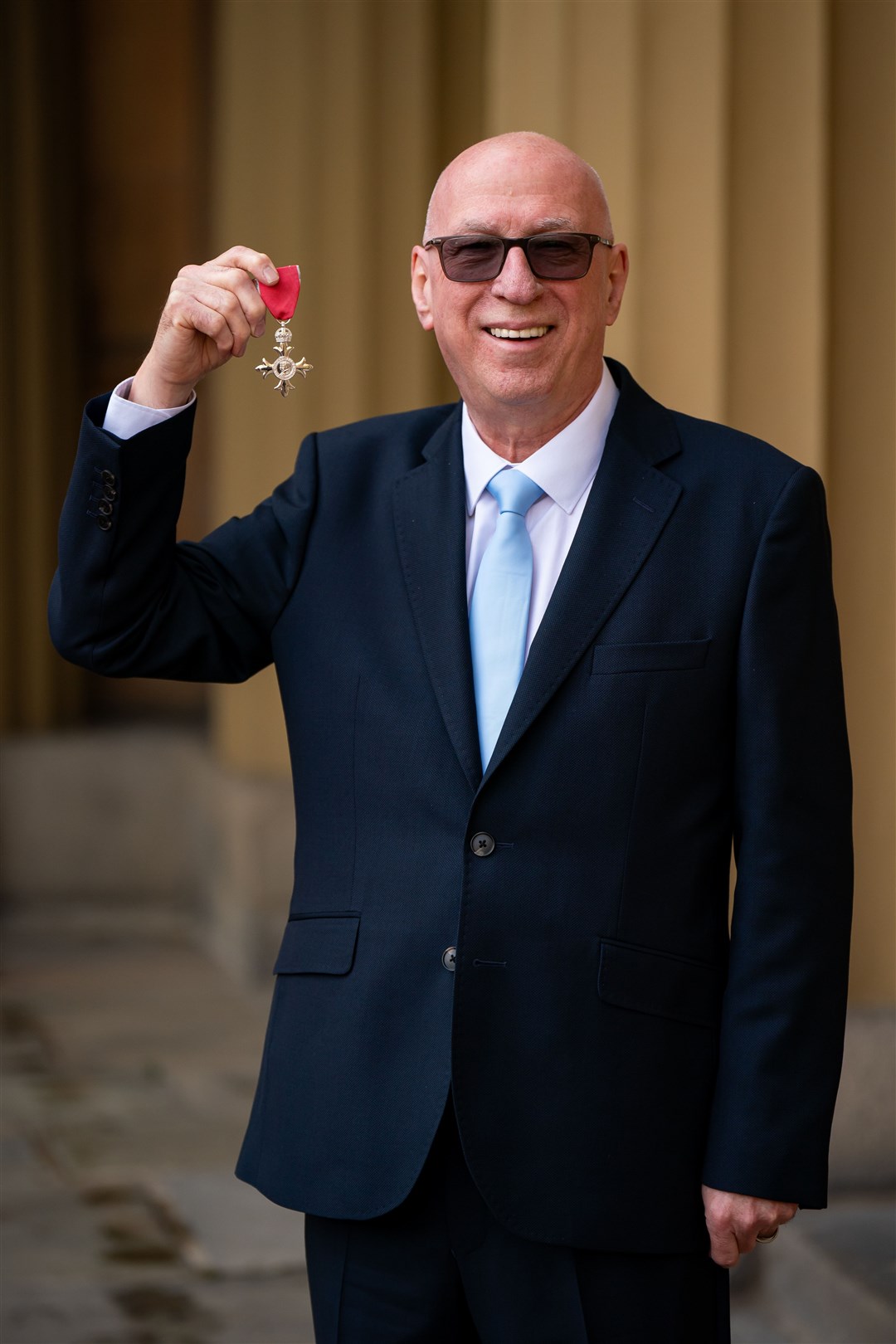 The Scottish presenter was made an MBE for his services to radio, autism awareness and charity (Aaron Chown/PA)