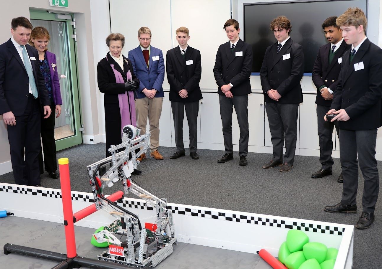 The Princess Royal watching a robotics demonstration at Gordonstoun