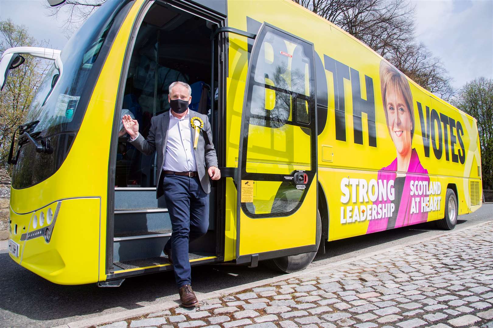 Moray SNP candidate Richard Lochhead leaves the SNP Campaign Bus at Keith...Picture: Daniel Forsyth..