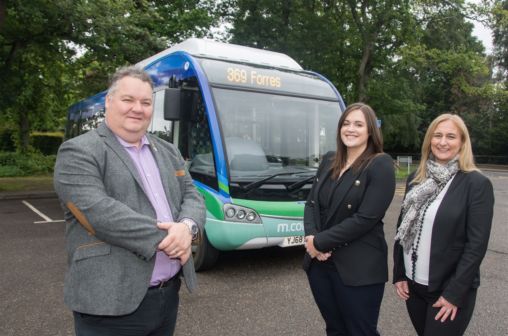 From left Graham Leadbitter (Moray Council Leader), Jayne Golding (HiTrans Project & Policy Officer) and Julie Cromarty (HiTrans Public Transport Info Officer) at the launch of the bus on June 13. Picture: Becky Saunderson. Image No.044170.
