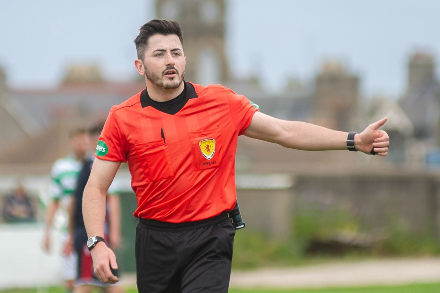 Referee Harry Bruce in action at Buckie Thistle's Victoria Park. Picture: Daniel Forsyth
