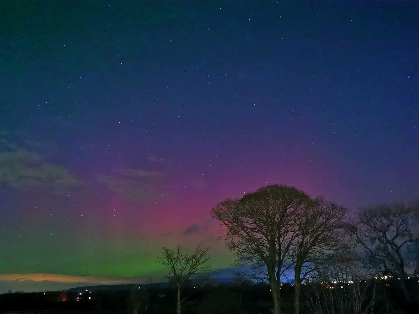 The aurora borealis over Grimsargh Wetlands in Lancashire (Hannah McGivern/PA)