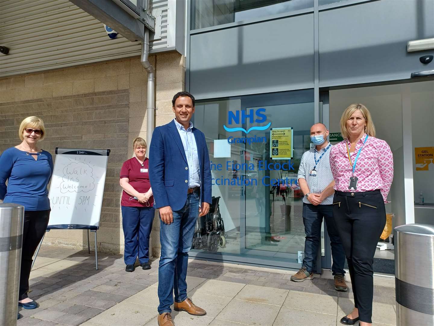 Anas Sarwar (centre) met the team at the Fiona Elcock Vaccination Centre.