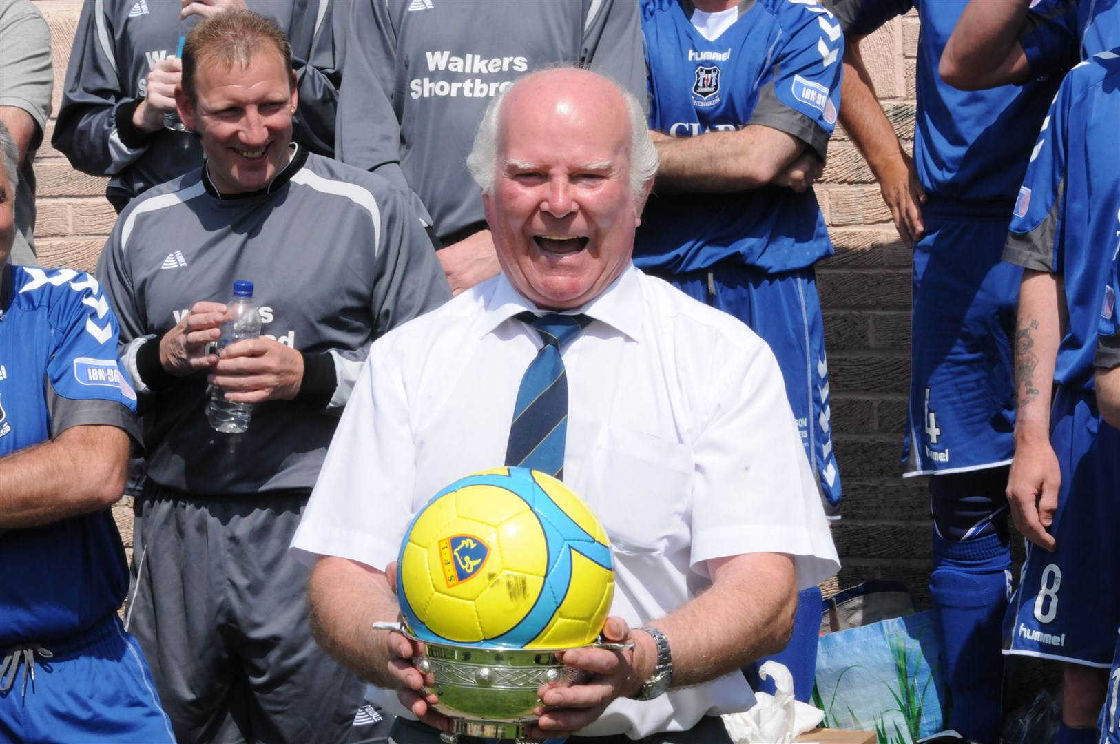 Mike Christie after being presented with a quaich at Elgin Boys Club in 2013.