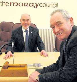 Moray Council convener George McIntyre (back), pictured with deputy convener Allan Wright, has announced he will not stand for re-election in May.