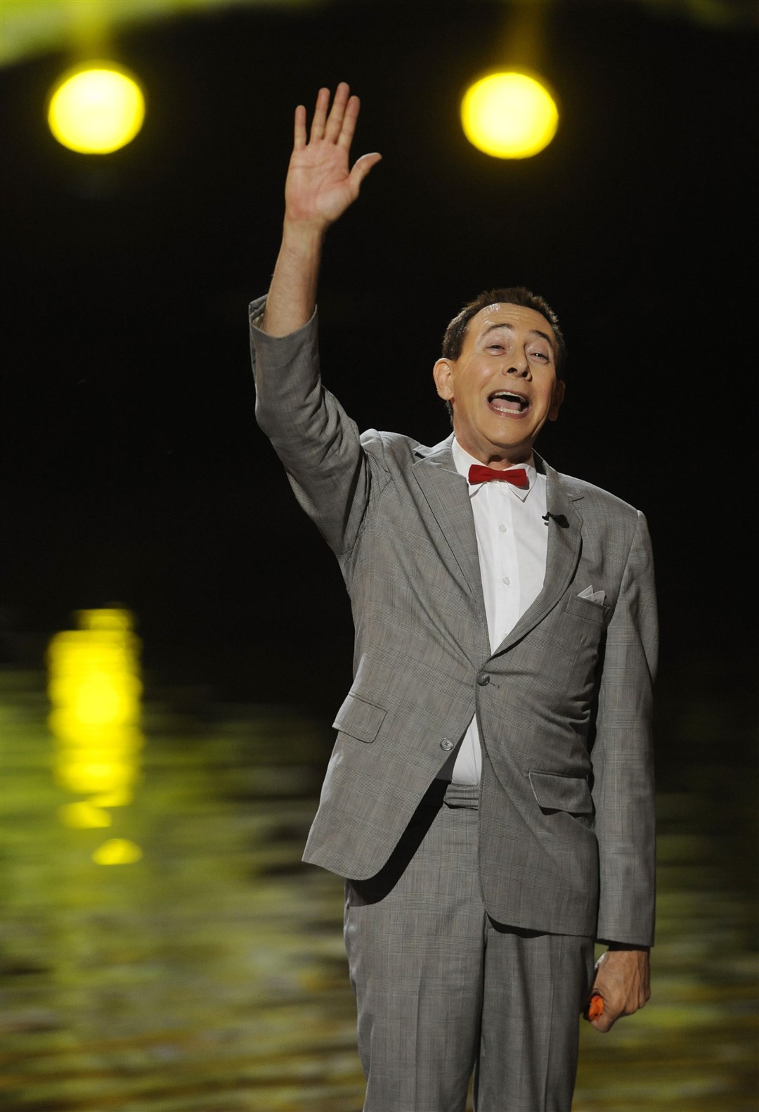 Paul Reubens, in character as Pee-wee Herman, waves to the crowd (Chris Pizzello/AP)