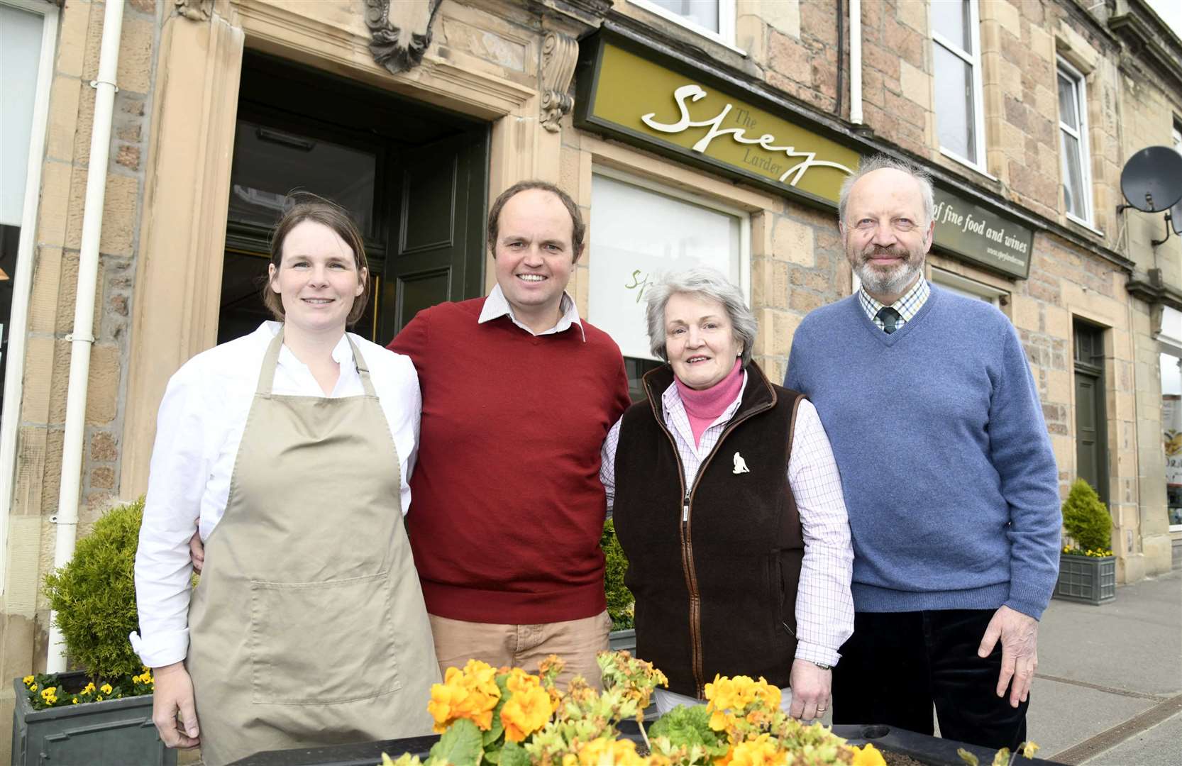 The Spey Larder's new owners John and Kate Smith with former owners David and Sheena Catto. Picture: Becky Saunderson