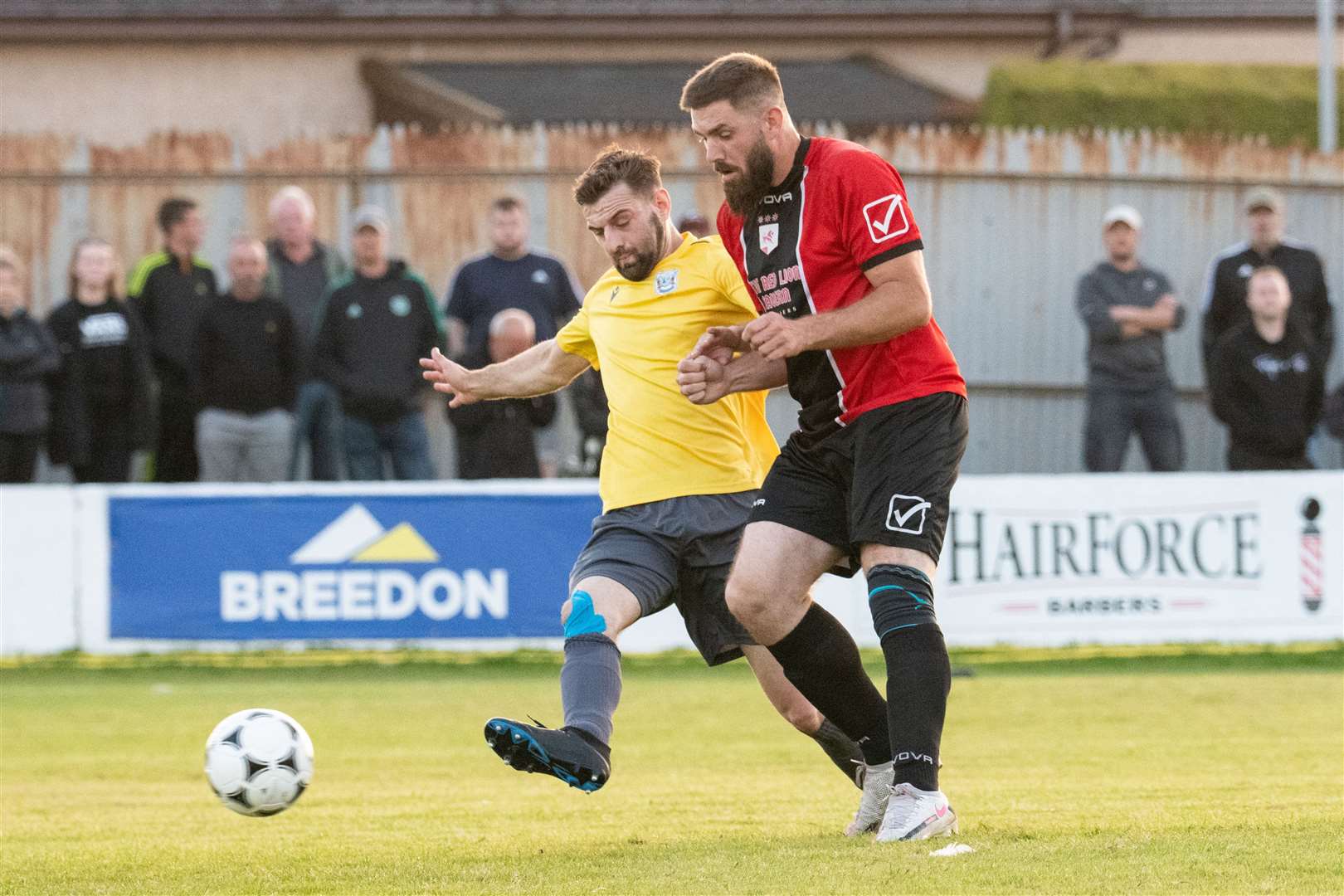 Hopeman's Connor McArthur (left) in action...Fochabers FC (7) vs Hopeman FC (2) - Mike Simpson Cup Final 2023 - Grant Park, Lossiemouth...Picture: Daniel Forsyth..