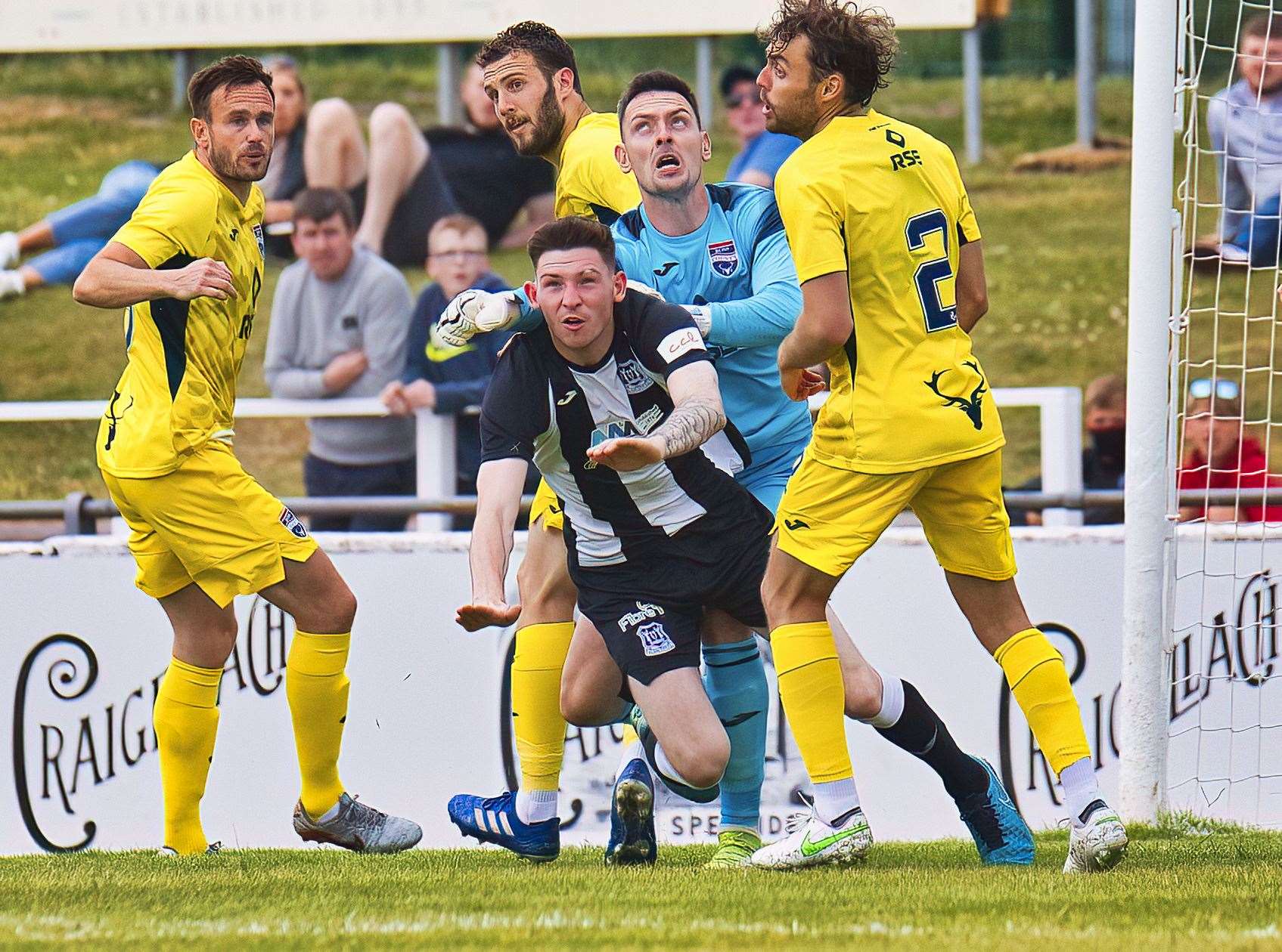 Creag Little in the thick of the action for Elgin City. Photo: Bob Crombie
