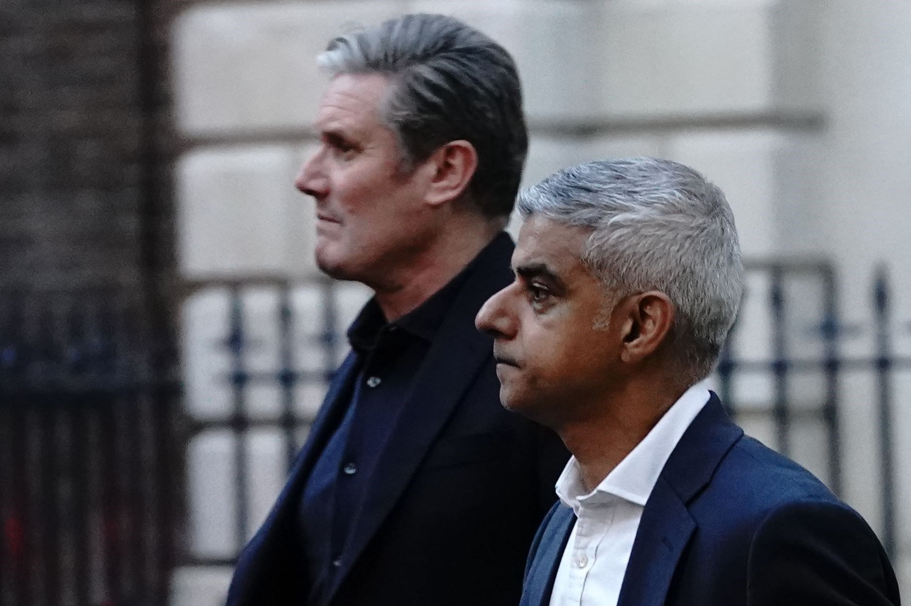 Labour leader Sir Keir Starmer (left) and Mayor of London Sadiq Khan leave the Rupert and Lachlan Murdoch annual party (Victoria Jones/PA)
