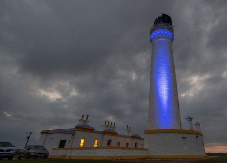 Covesea Skerries Lighthouse lit up in 2019 for World Parkinson’s Day.