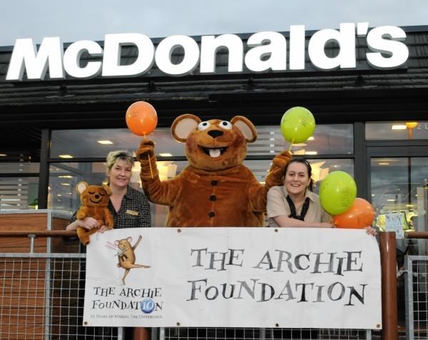 Archie, the appeal mascot, with Sheila McDonald (left) and Joanna Innes from McDonald's, Elgin.