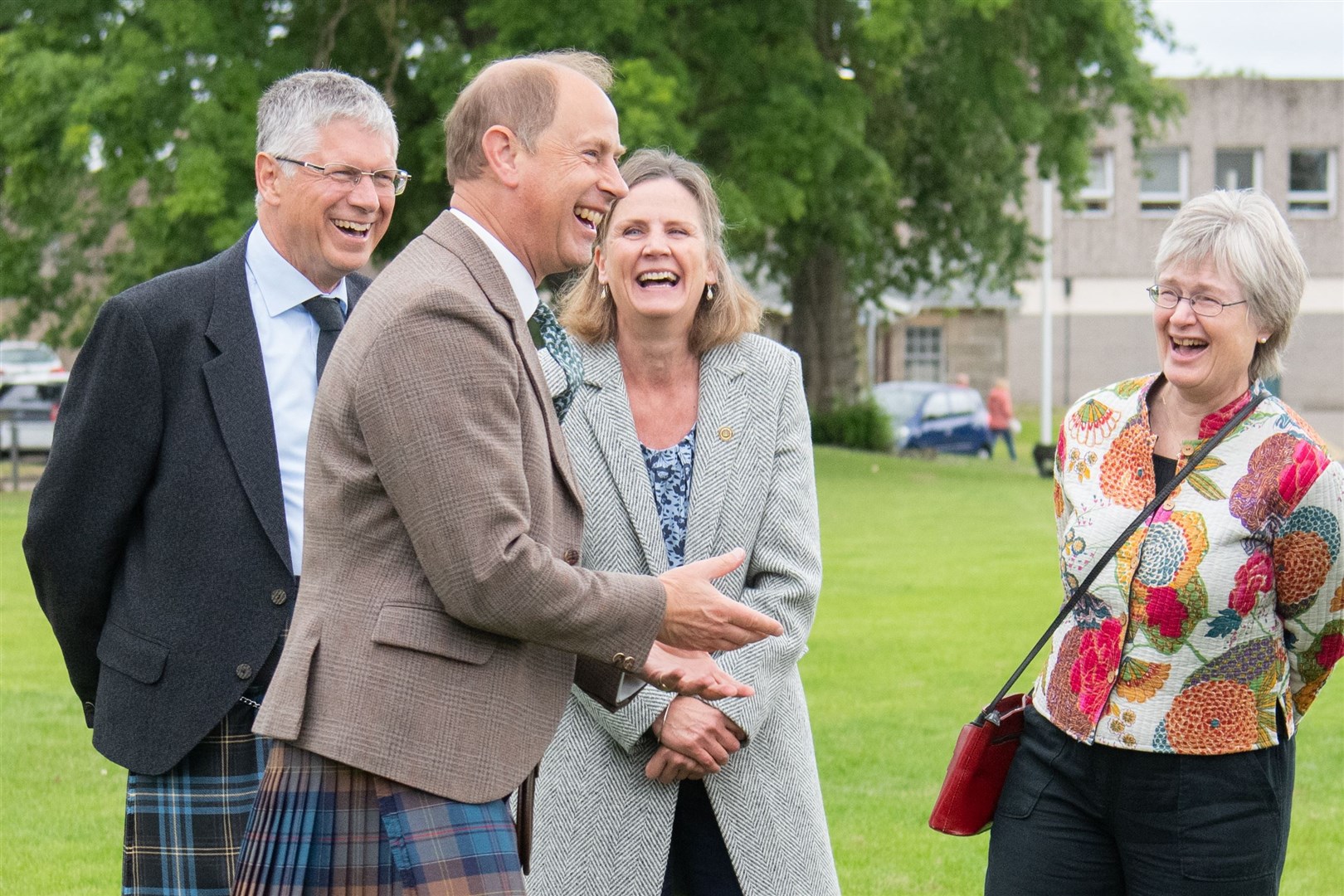 Prince Edward laughs with former councillor Claire Feaver (right) on his visit to Elgin's Cooper Park. Picture: Daniel Forsyth