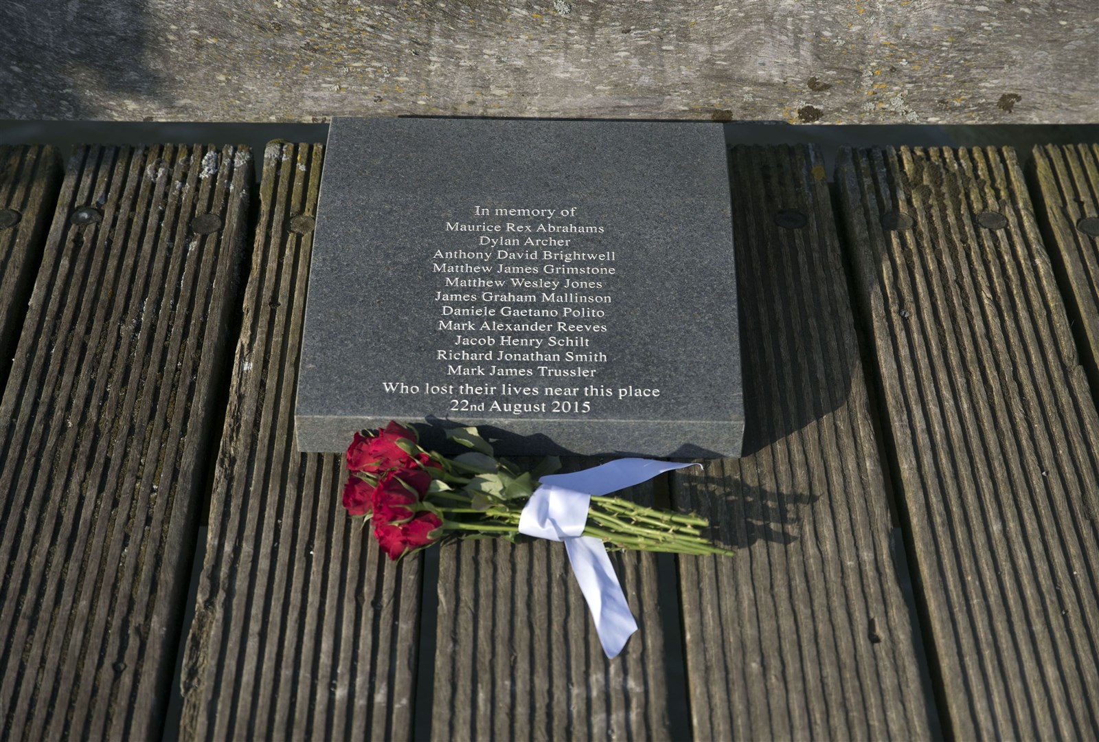 A memorial to the victims has been installed on a bridge near to the crash site (PA)