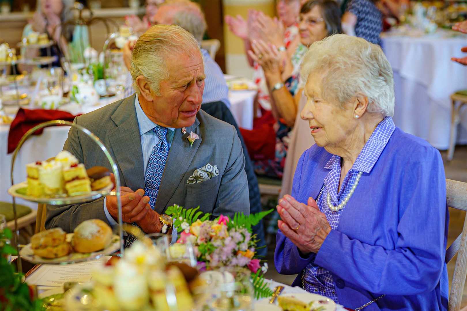 Charles chats with Elizabeth Powell (Ben Birchall/PA)